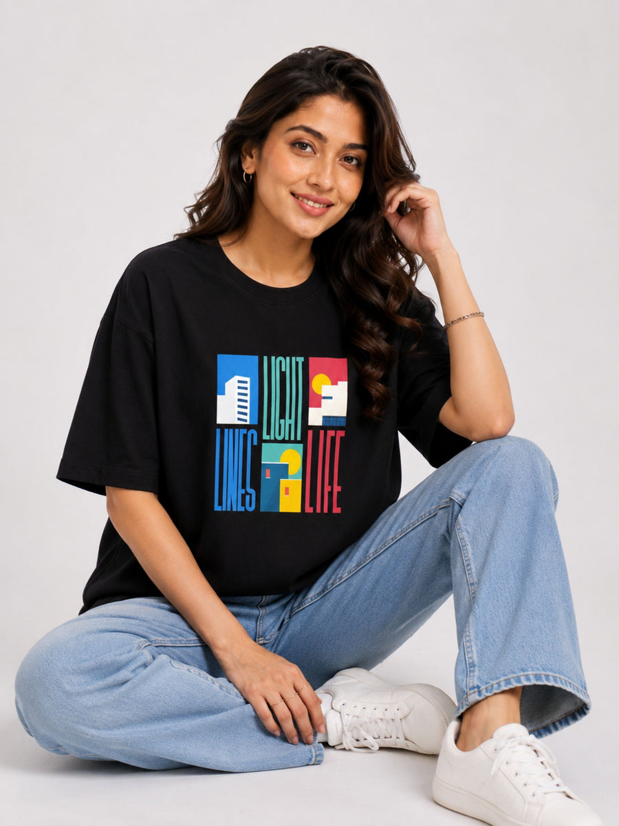 Black oversized fit Architect Printed T-shirt For Women with I Sell Solutions graphic worn by male model