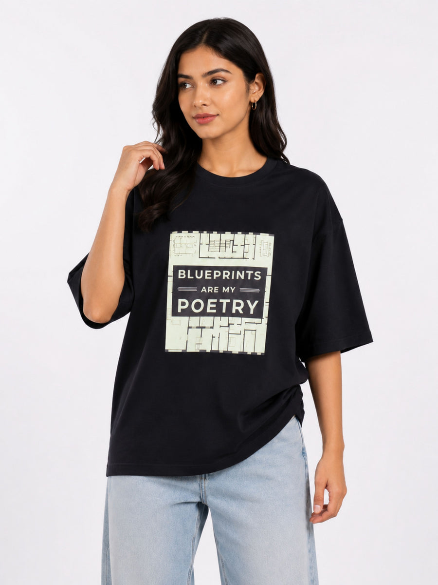 Black oversized fit Architect Printed Tshirt For Women with motivational graphic and casual light blue jeans