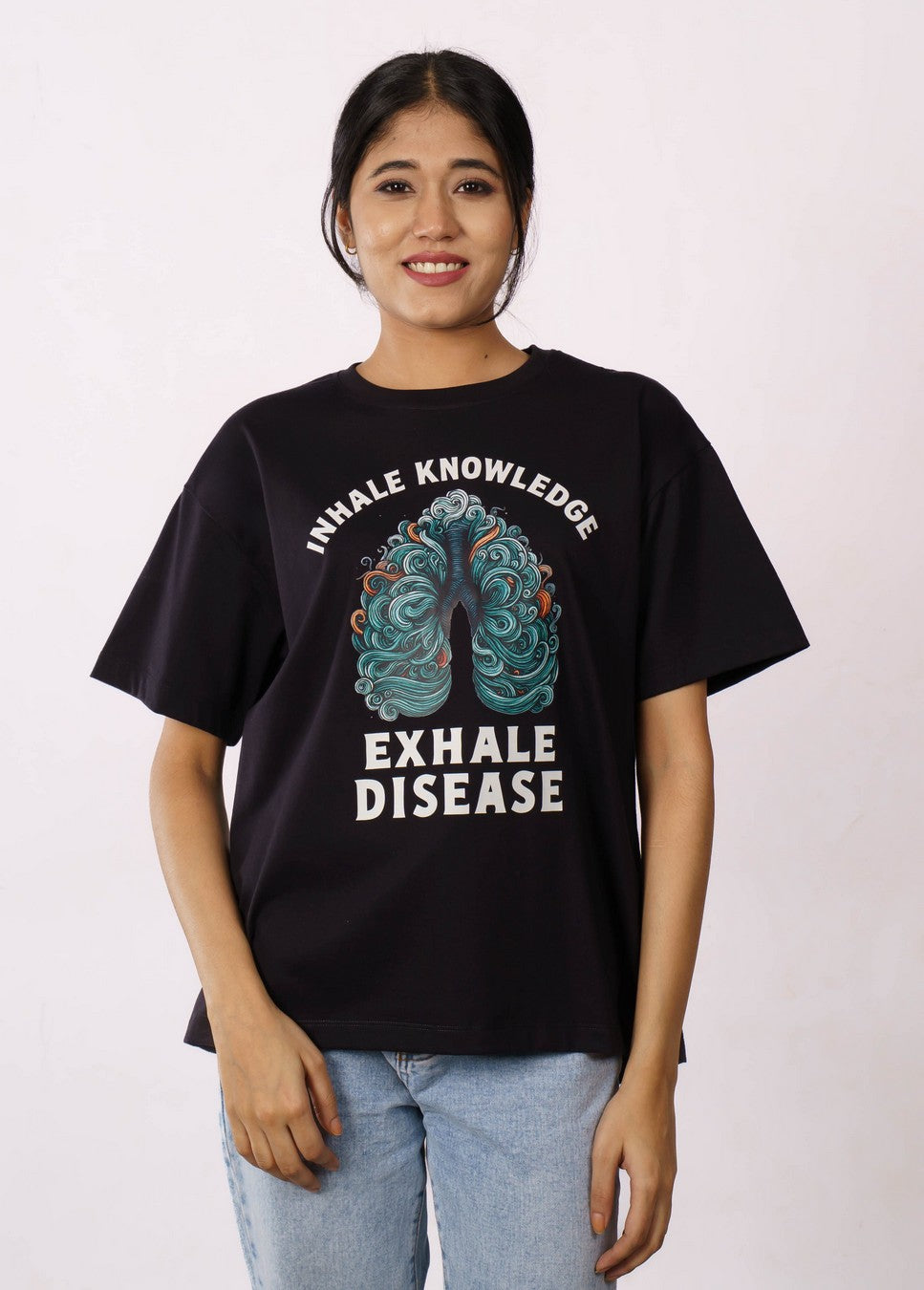 Black oversized fit Tshirt for women with inhale knowledge exhale disease graphic from Bandar Baant Collections