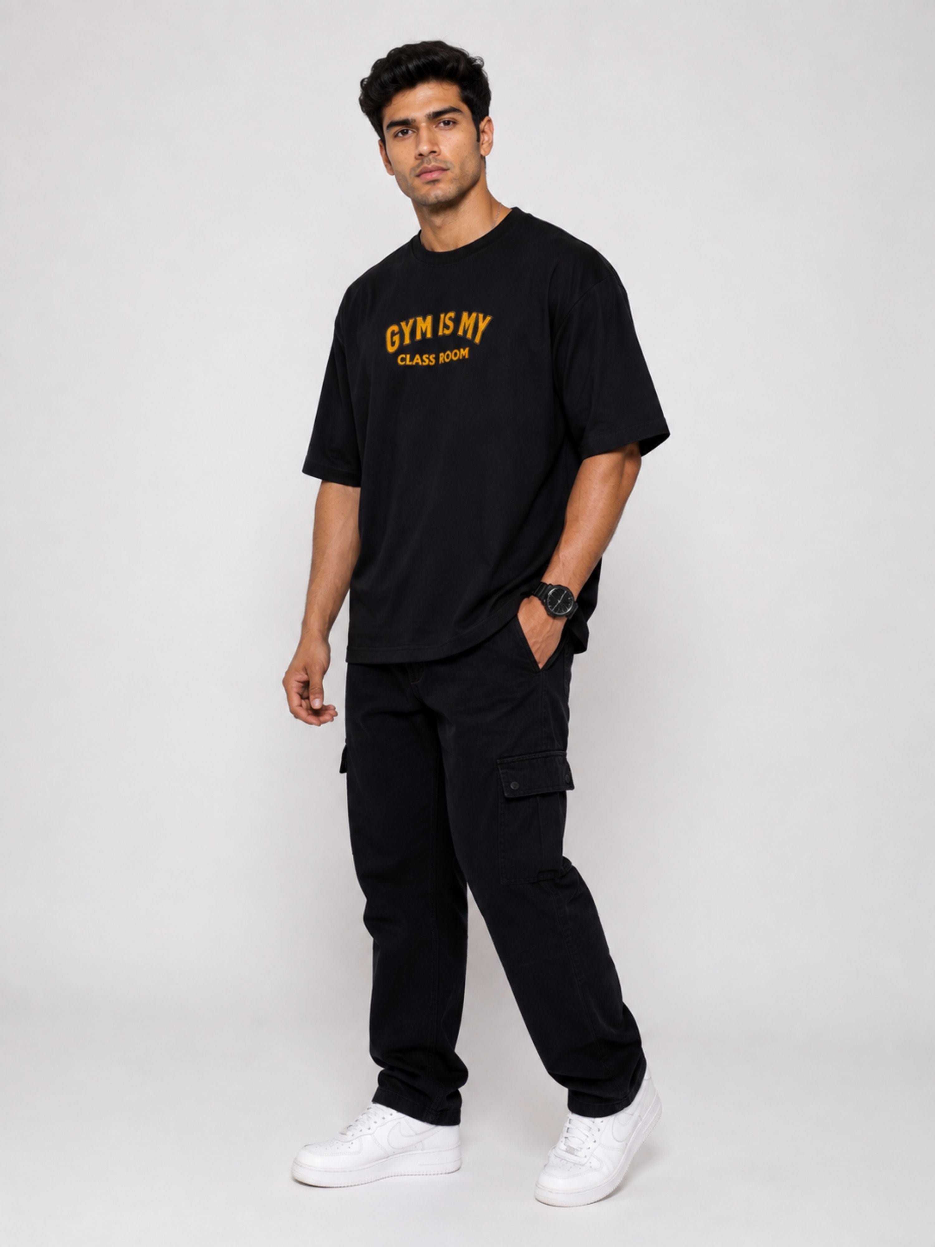 Bandar Baant Collections oversized fit black Gym Printed T shirts For Men with yellow text worn by male model