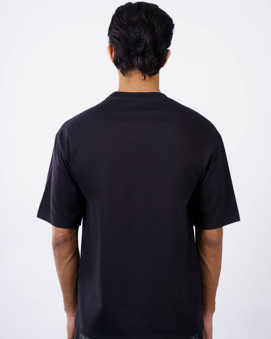 Back view of oversized fit Cardiologist Quote Tshirt For Men in black from Bandar Baant Collections