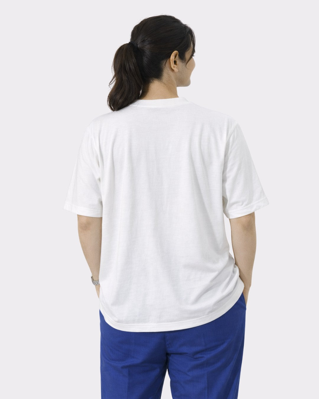 Back view of woman wearing oversized fit white Chartered Accountant T-shirt For Women by Bandar Baant Collections