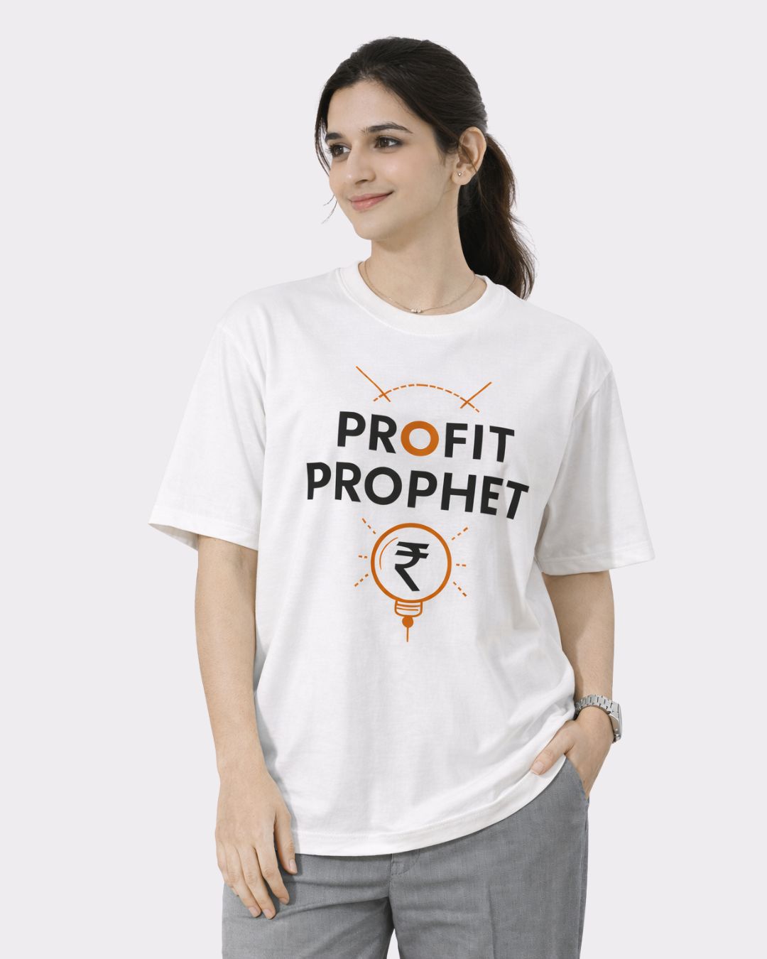 Oversized fit white Chartered Accountant Trendy T-shirt For Women with Profit Prophet graphic worn by woman
