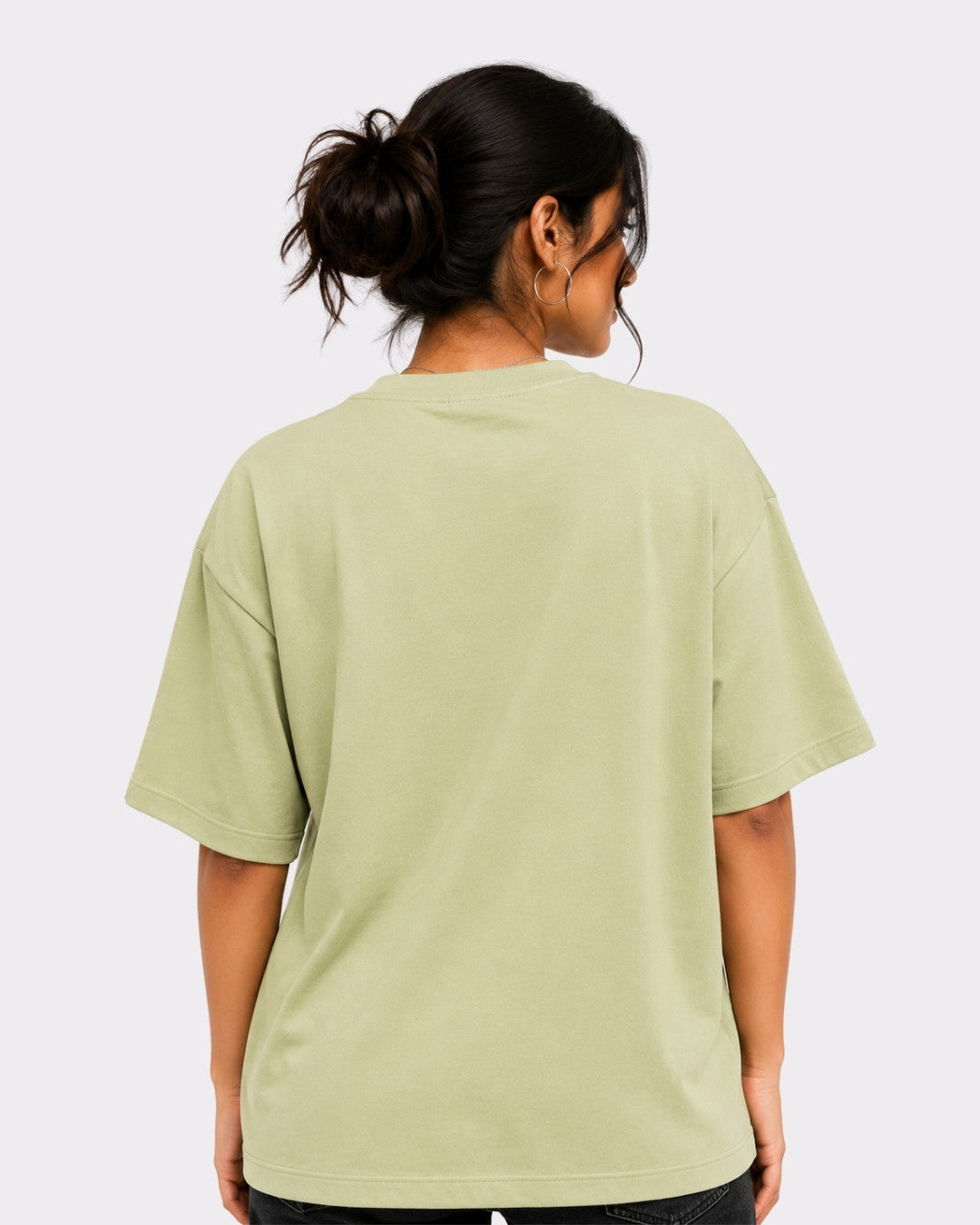 Back view of Coffee Lovers Oversized T-Shirt for Women in light green from Bandar Baant Collections