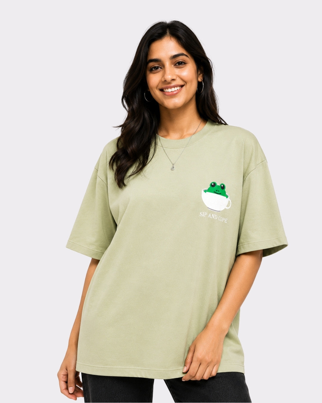 Coffee Lovers Oversized T-Shirt for Women in light green with frog and coffee cup graphic by Bandar Baant Collections