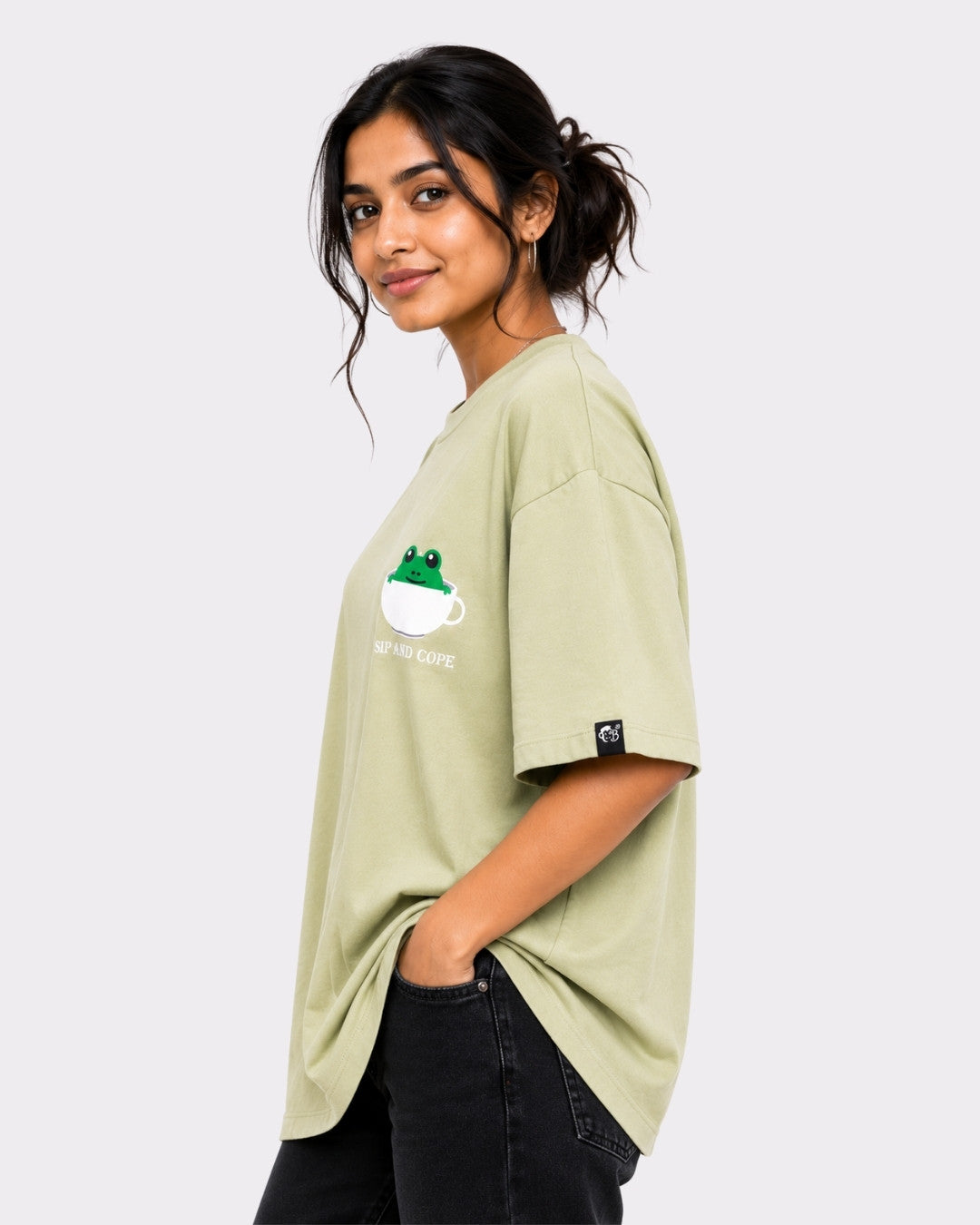 Coffee Lovers Oversized T-Shirt for Women in light green with frog coffee mug graphic by Bandar Baant Collections