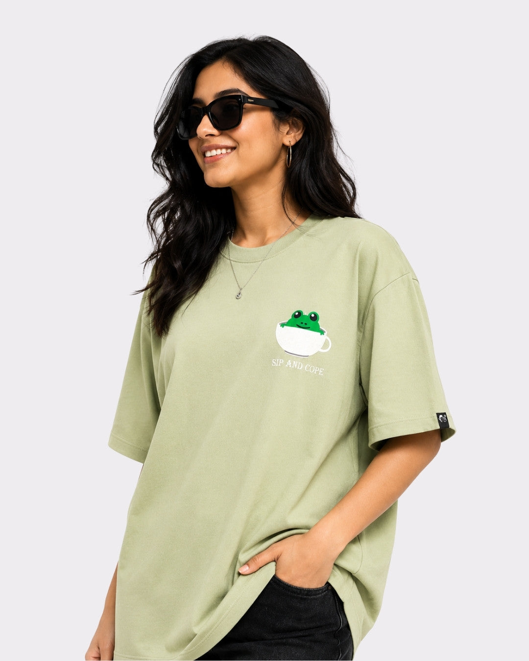 Coffee Lovers Oversized T-Shirt for Women in light green with frog cup graphic by Bandar Baant Collections