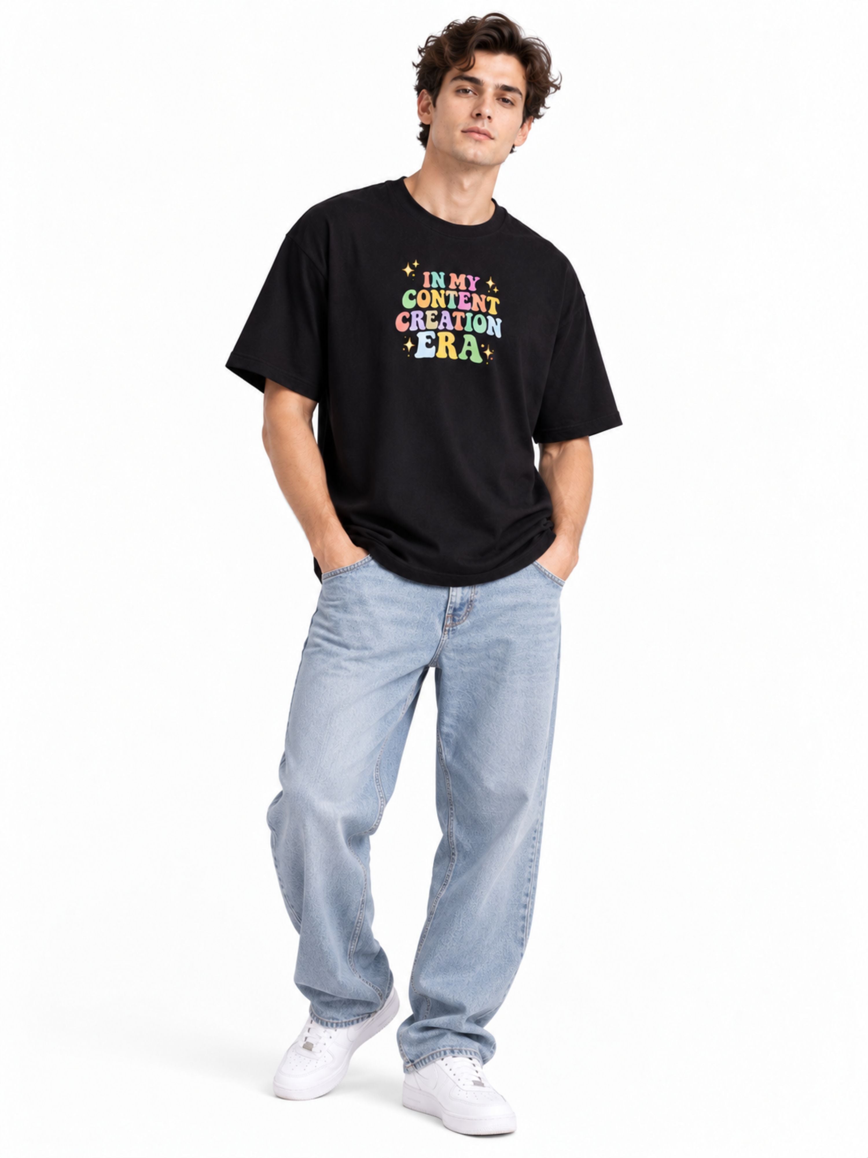 Oversized fit Content Creators T-Shirt For Men in black with colorful text worn by male model