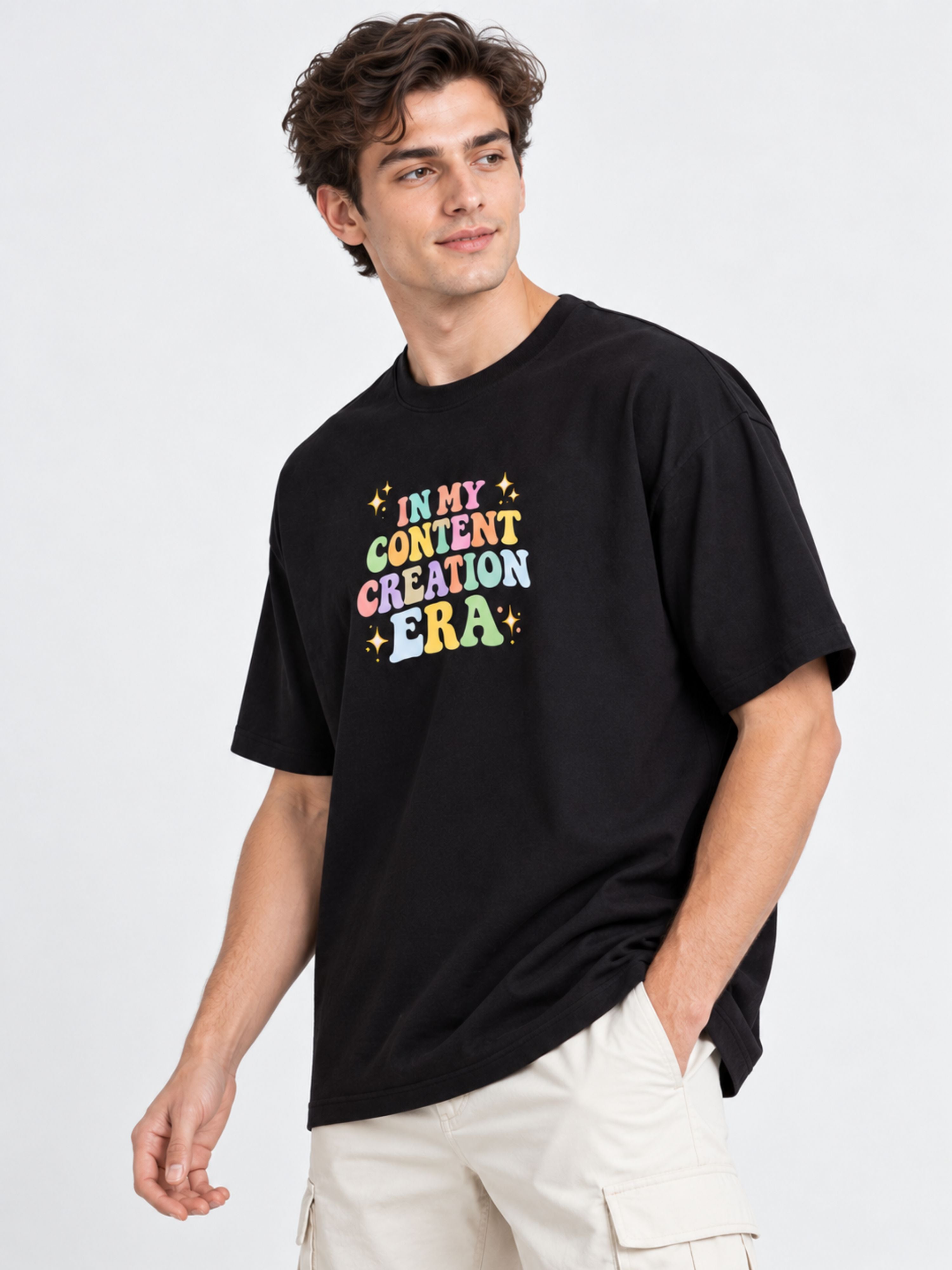 Black oversized fit Content Creators T-Shirt For Men with colorful text design from Bandar Baant Collections