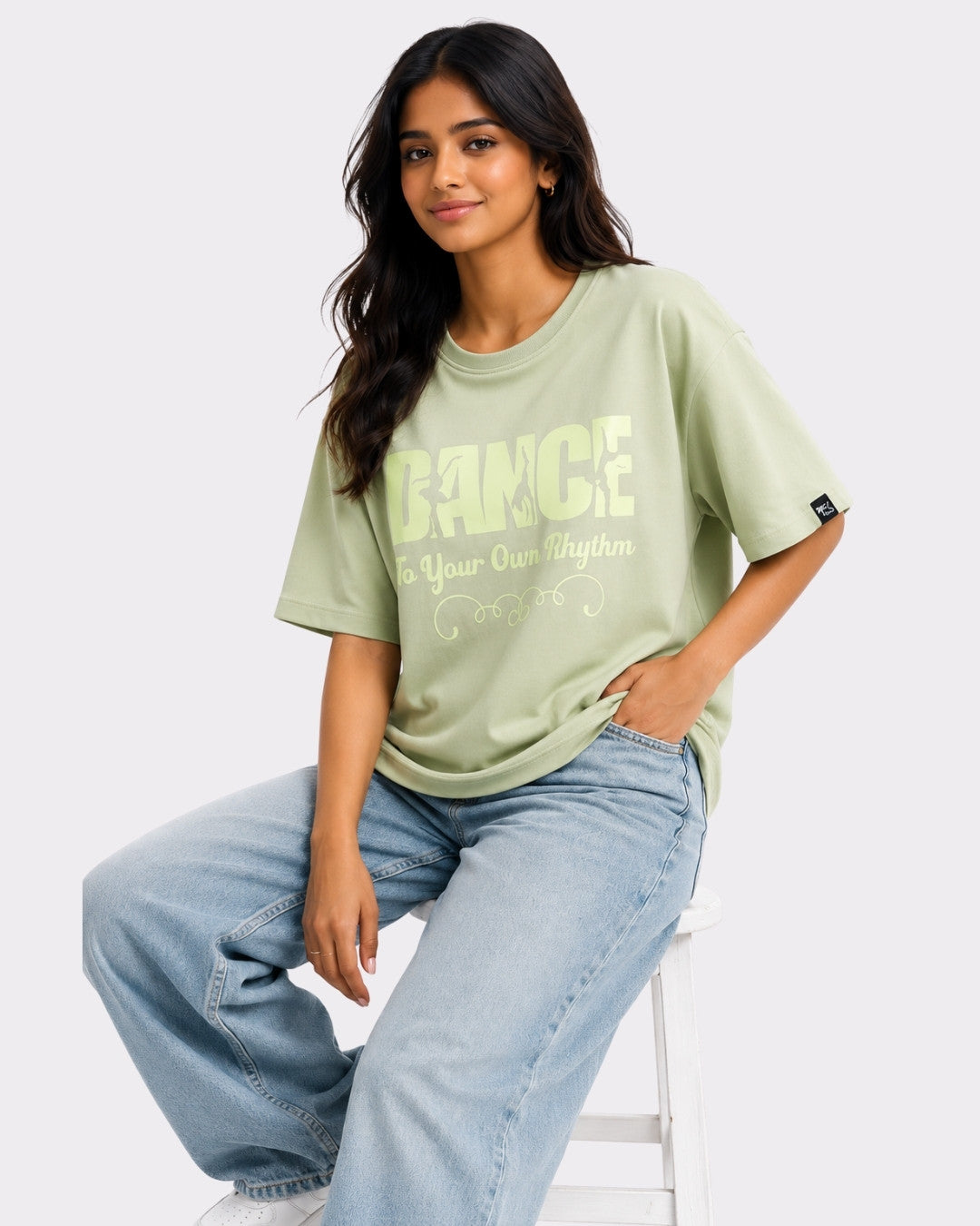 Woman wearing Dance to Your Own Rhythm Oversized T-shirt For Women in sage green by Bandar Baant Collections