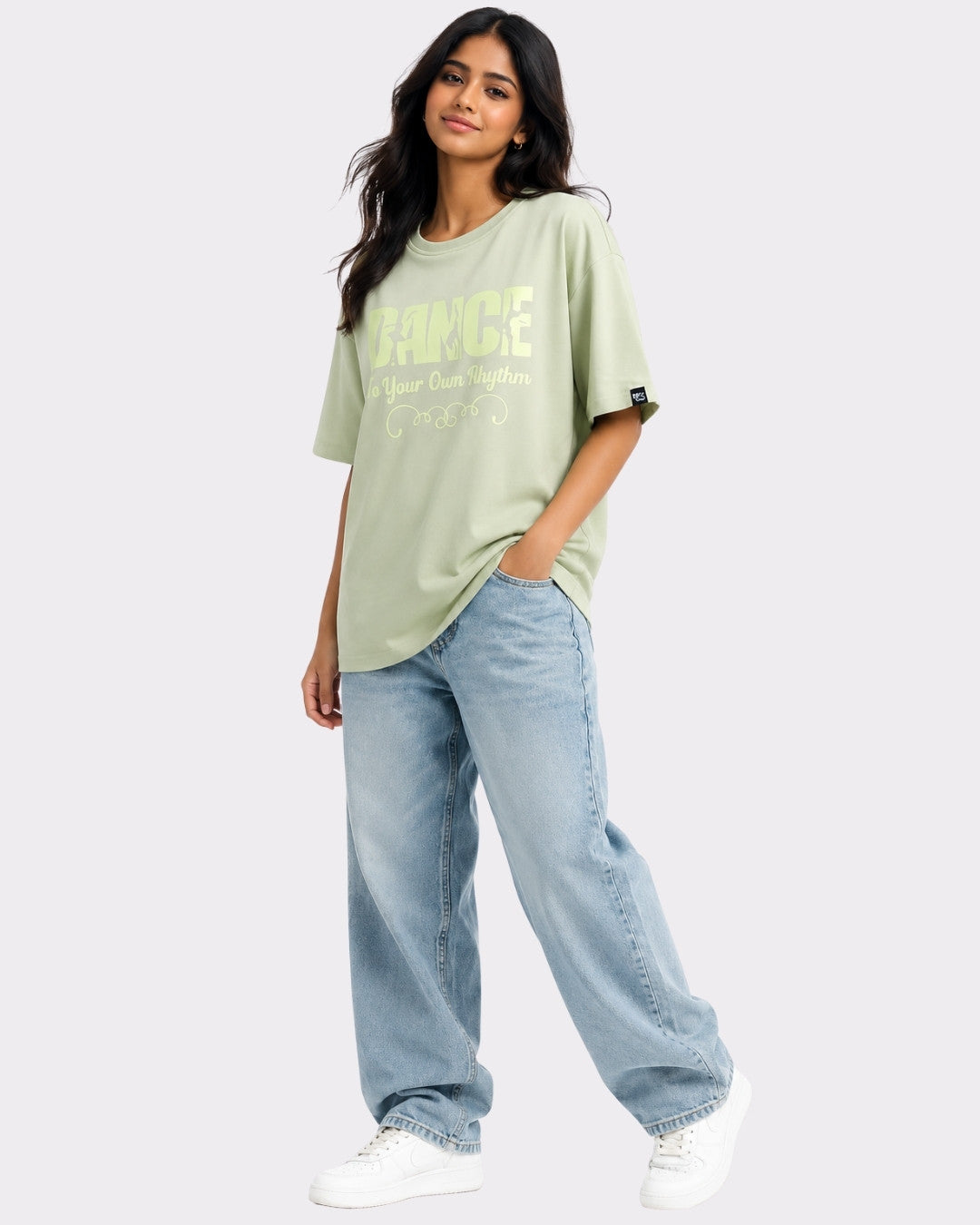 Woman wearing Dance to Your Own Rhythm Oversized T-shirt For Women in light green by Bandar Baant Collections