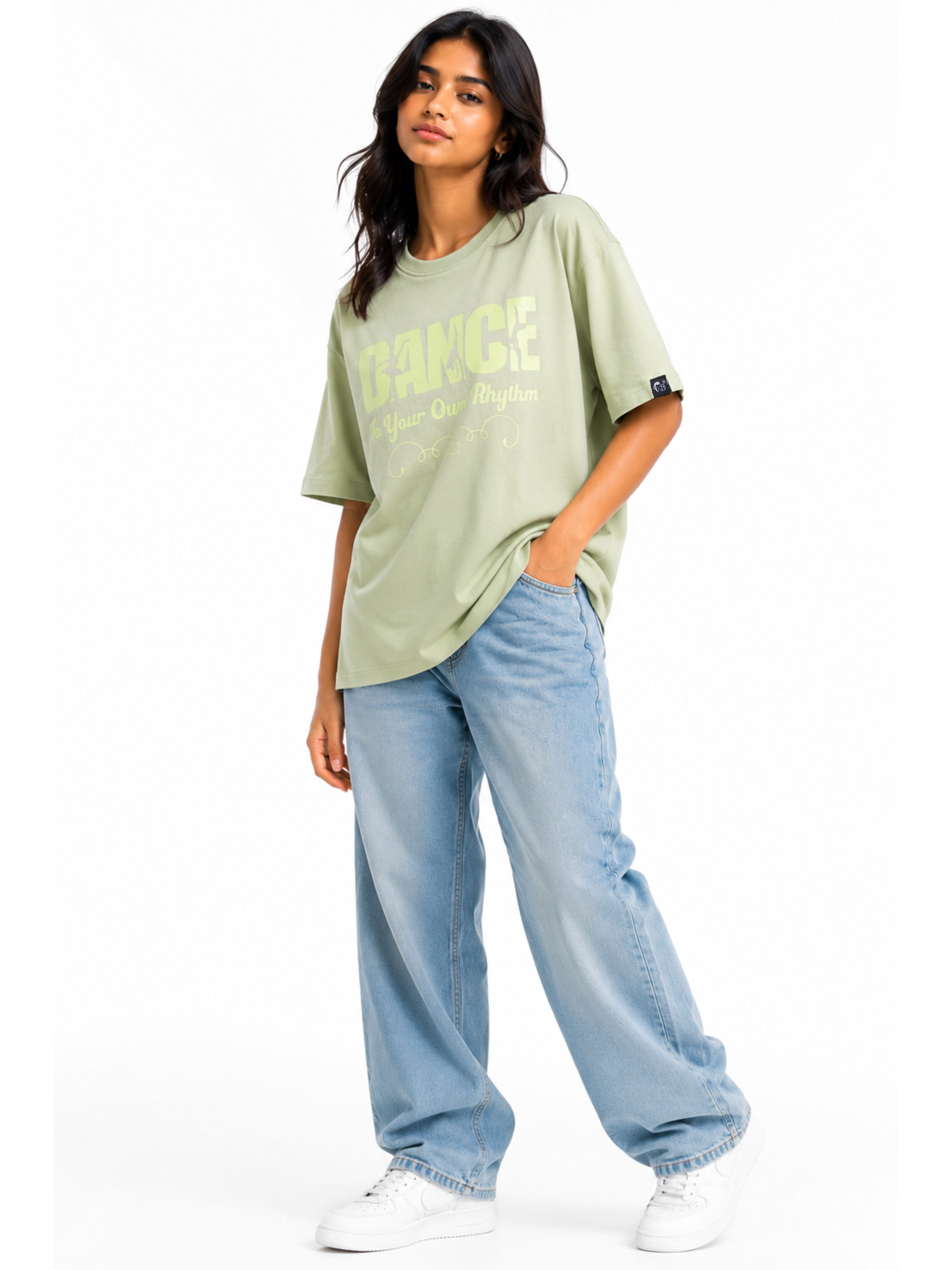 Dancer Oversized T-shirt For Women in light green from Bandar Baant Collections styled with loose jeans and white sneakers