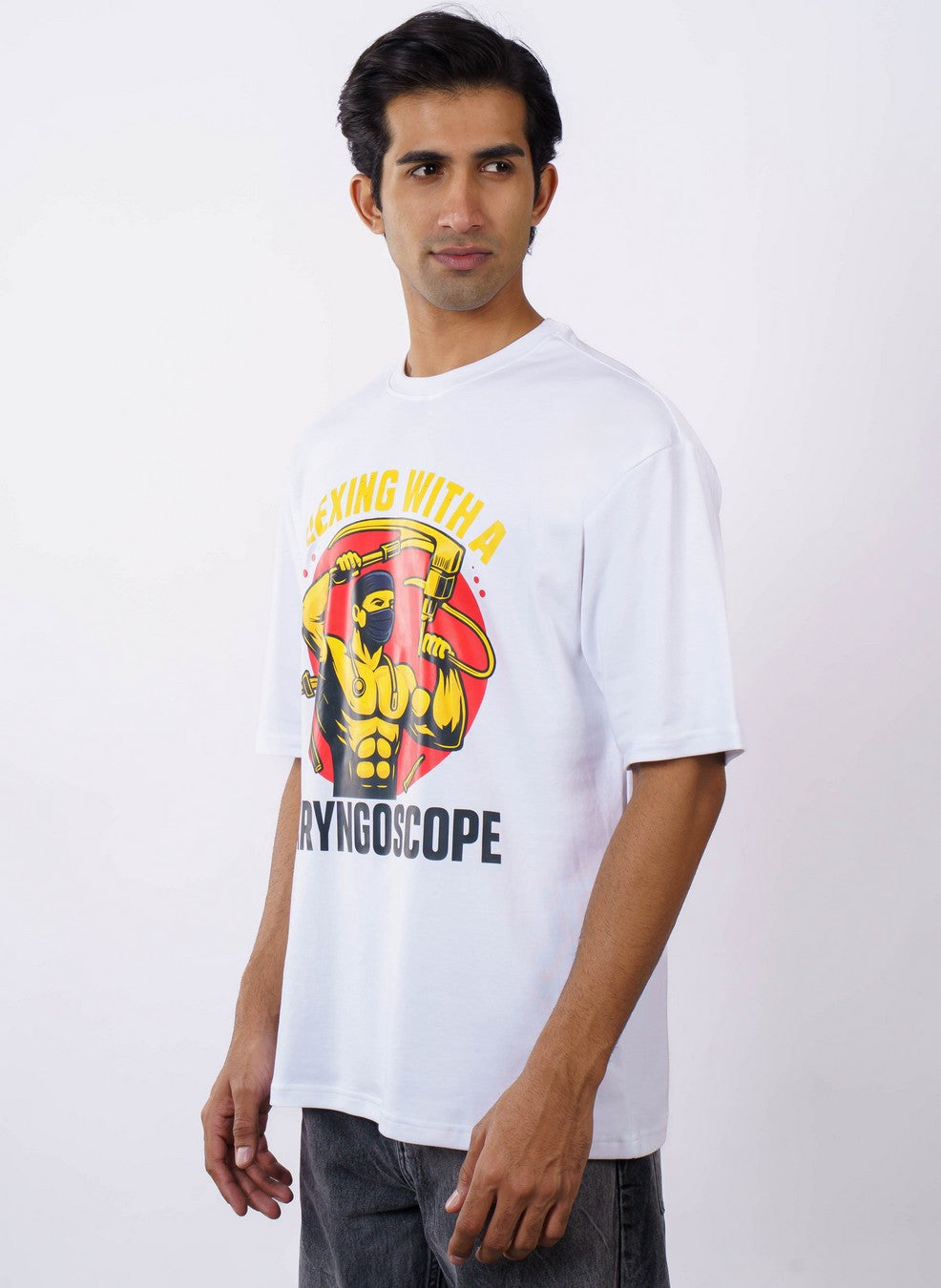 White oversized fit ENT Specialist Printed T Shirt For Men with colorful medical graphic from Bandar Baant Collections