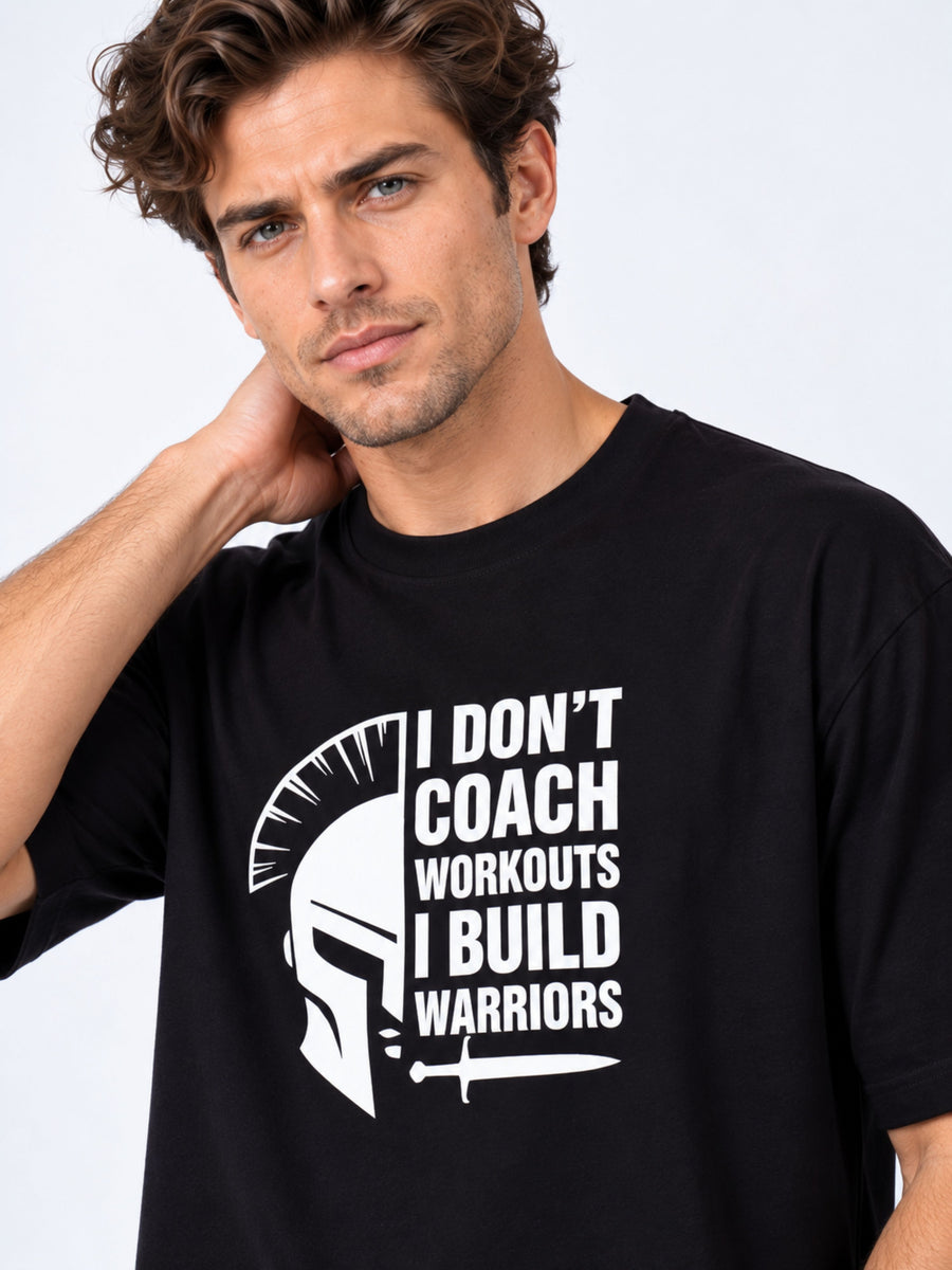 Black oversized Fitness Trainers Quote T-Shirt For Men with white warrior helmet graphic and motivational quote