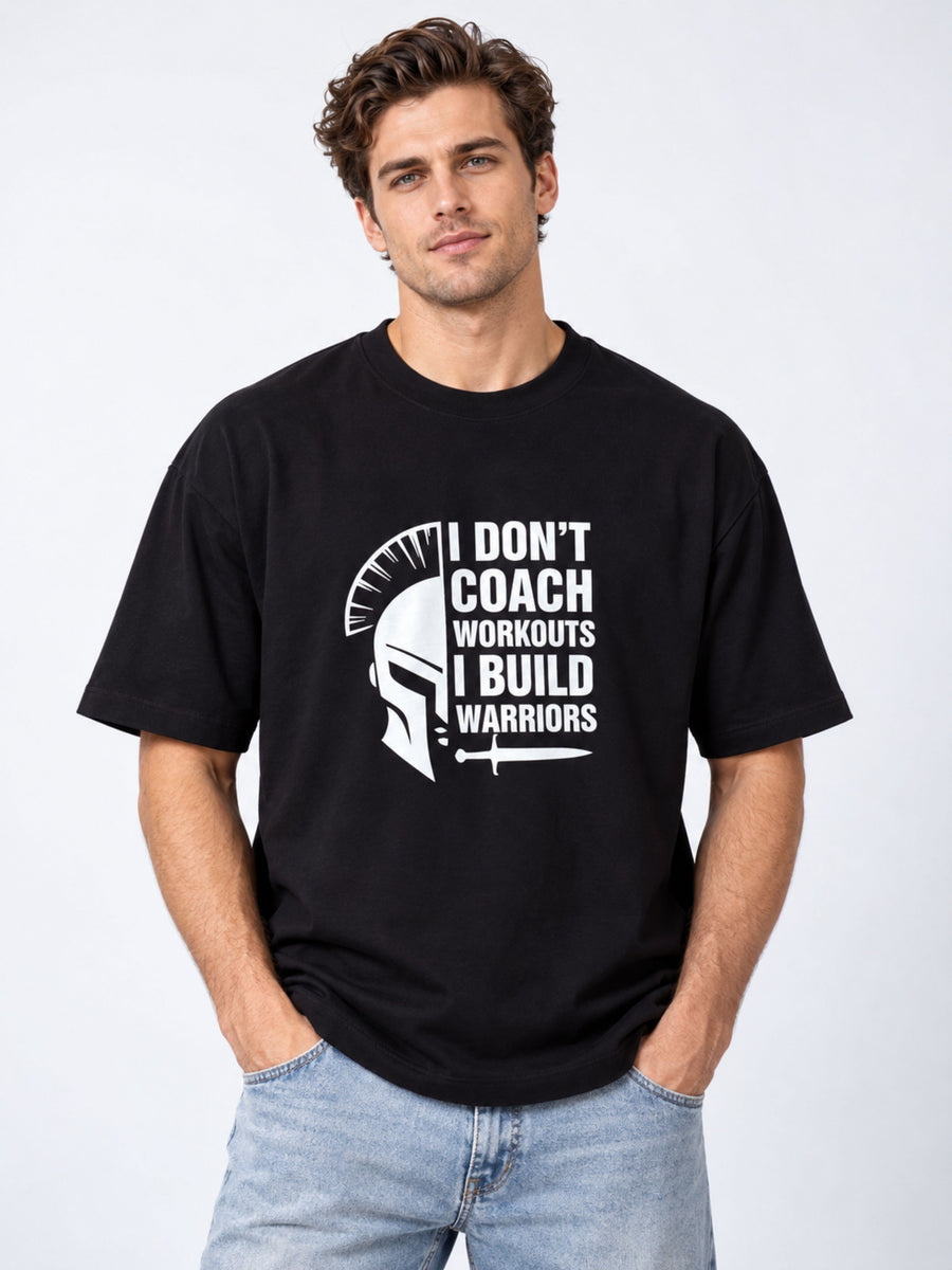 Black oversized fit Fitness Trainers Quote T-Shirt For Men with warrior helmet and motivational text