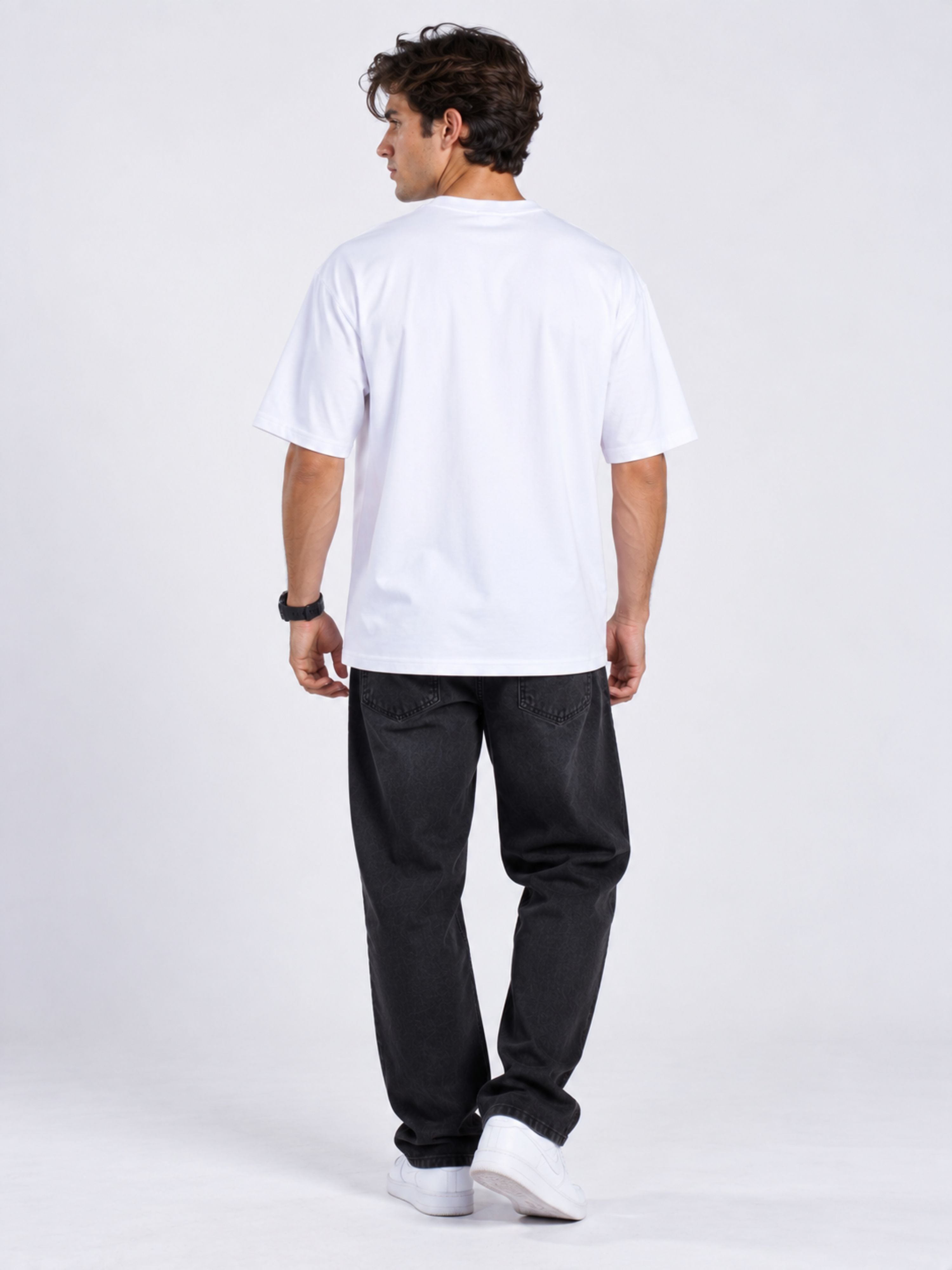 Back view of man wearing oversized fit Fitness Trainers Tshirt For Men in white by Bandar Baant Collections