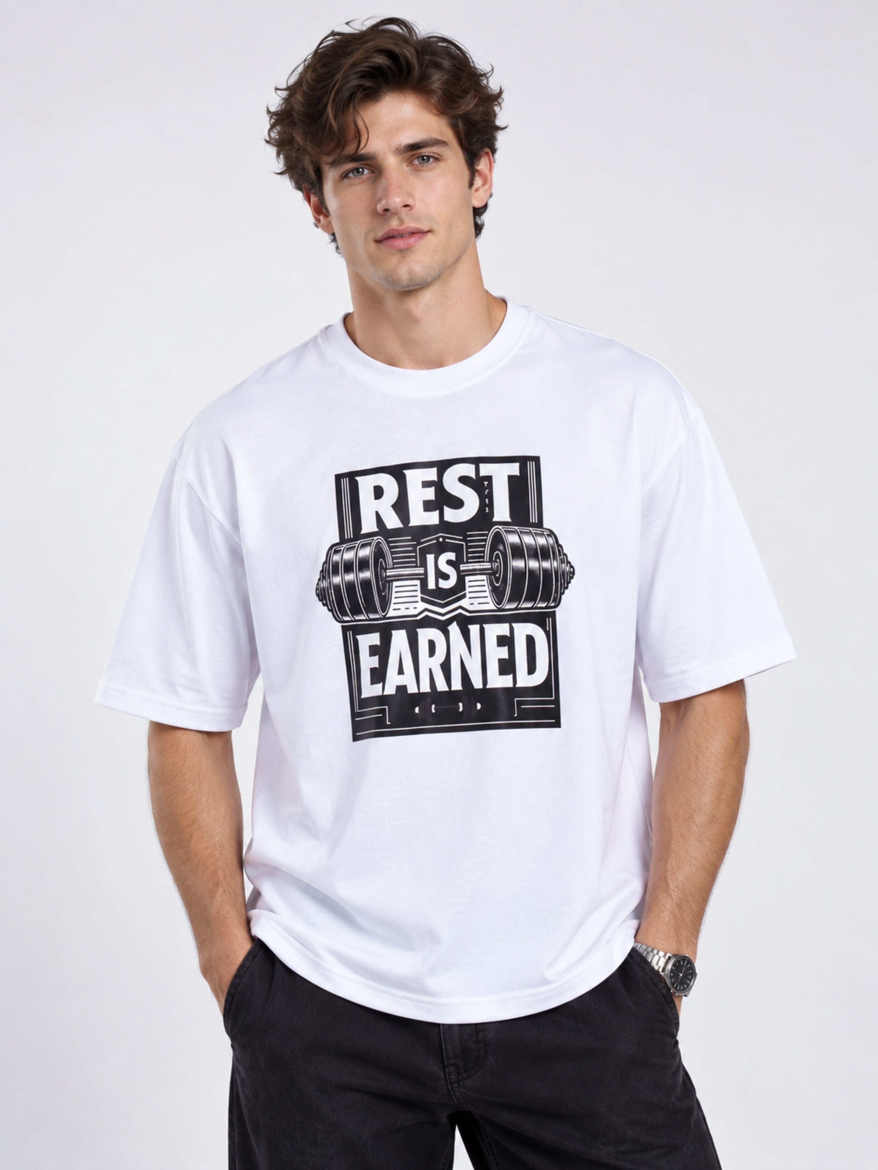 Oversized fit Fitness Trainers Tshirt For Men in white with Rest is Earned graphic from Bandar Baant Collections