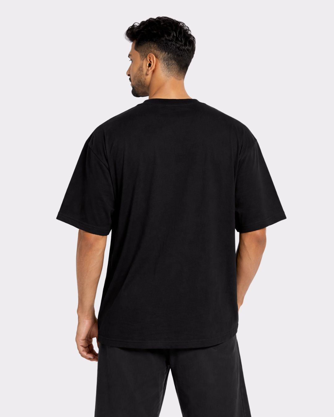 Black Gym Enthusiast Oversized Trendy T-shirt For Men from Bandar Baant Collections shown from back