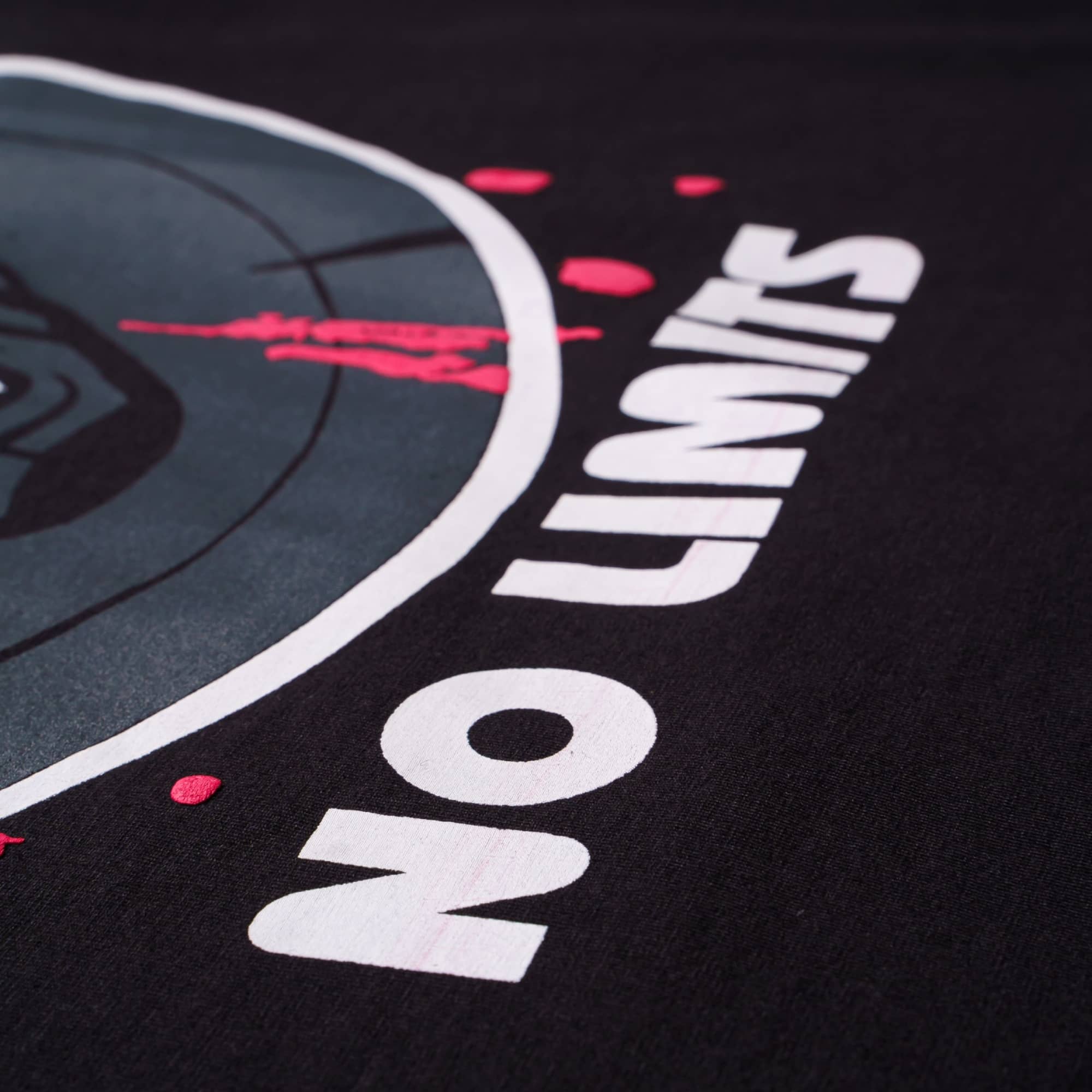 Close-up of Gym Enthusiast Quirky Tshirt For Men with No Limits text and graphic print