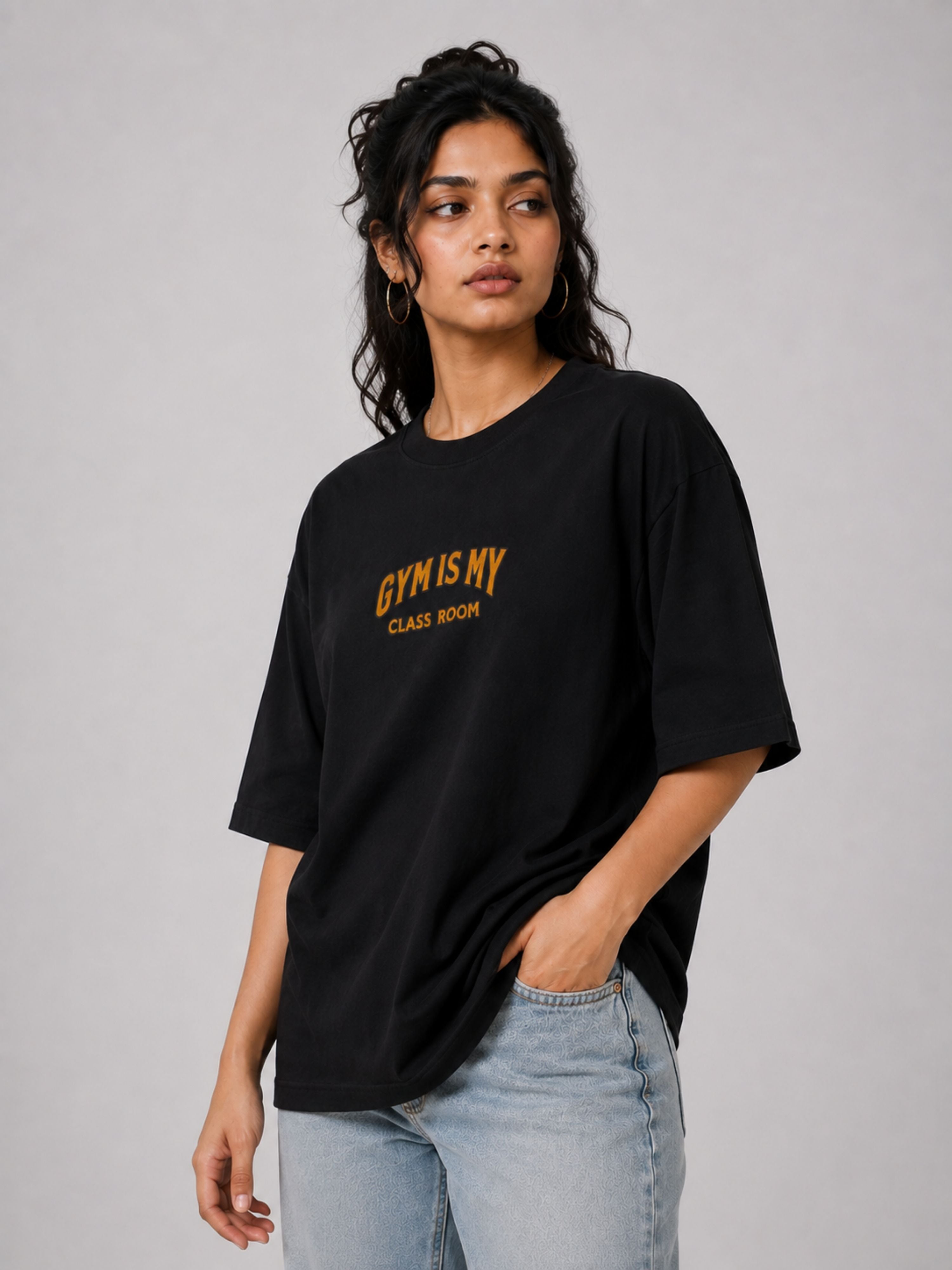 Oversized fit black Gym T-shirt For Women with yellow text worn by model from Bandar Baant Collections