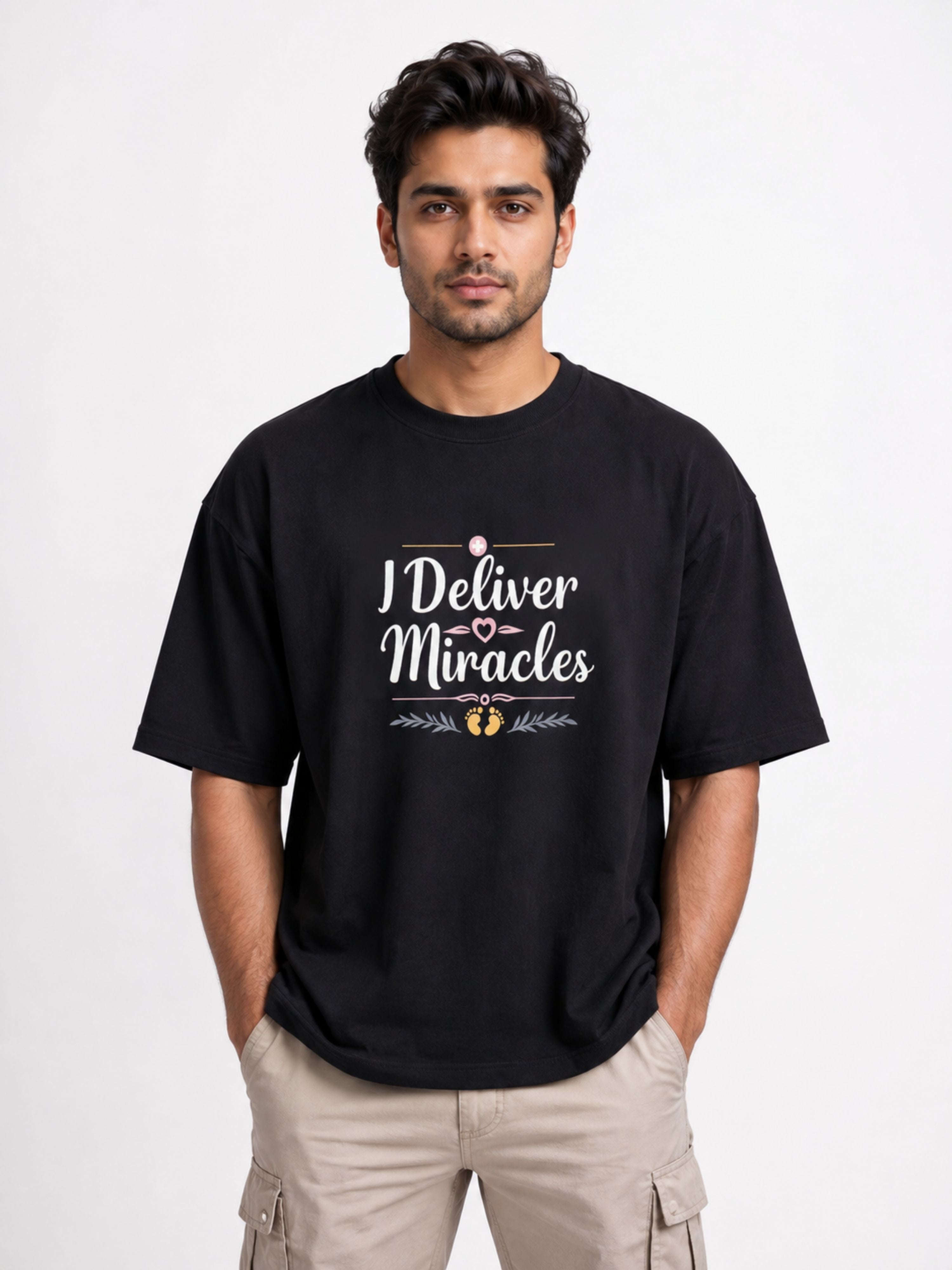 Black oversized fit Tshirt from Bandar Baant Collections with I Deliver Miracles text Gynaecologist Quote Tshirt For Men