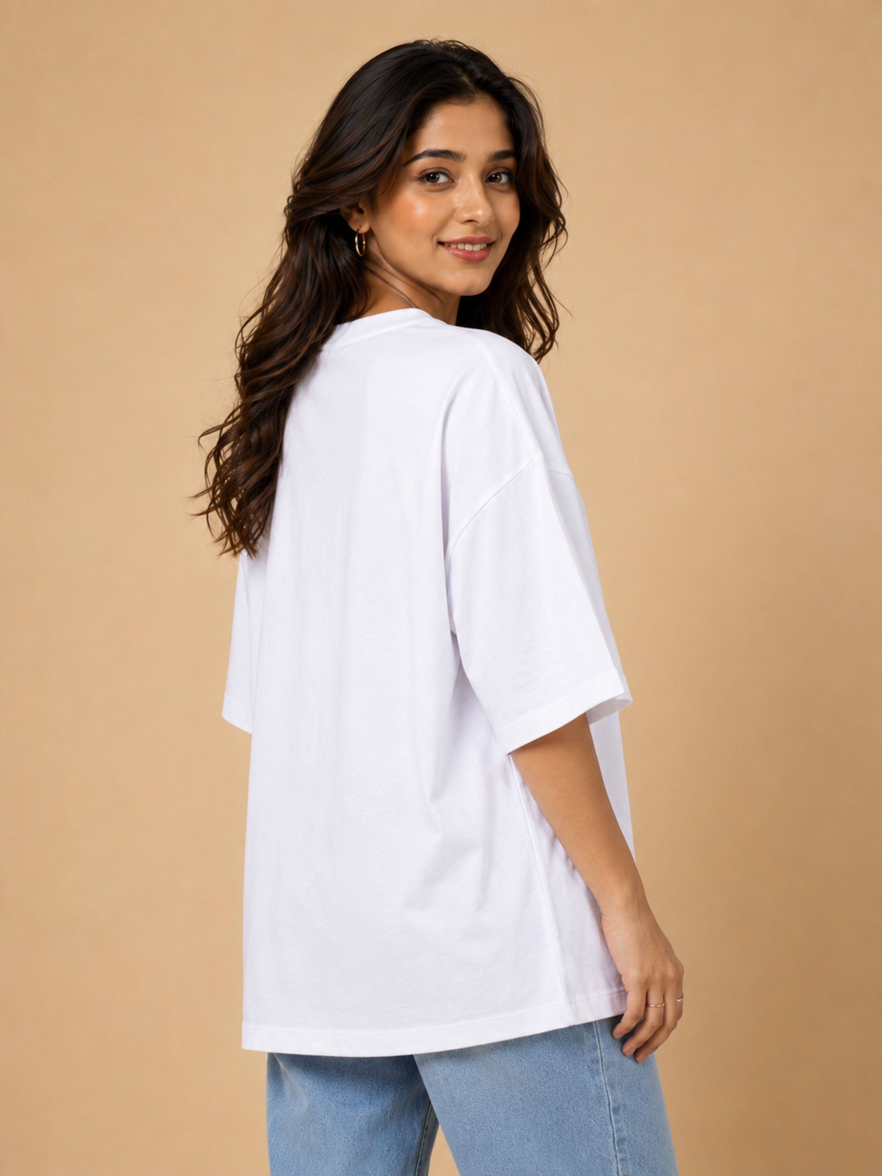 Woman wearing oversized fit white Gynaecologist T-Shirt For Women from Bandar Baant Collections