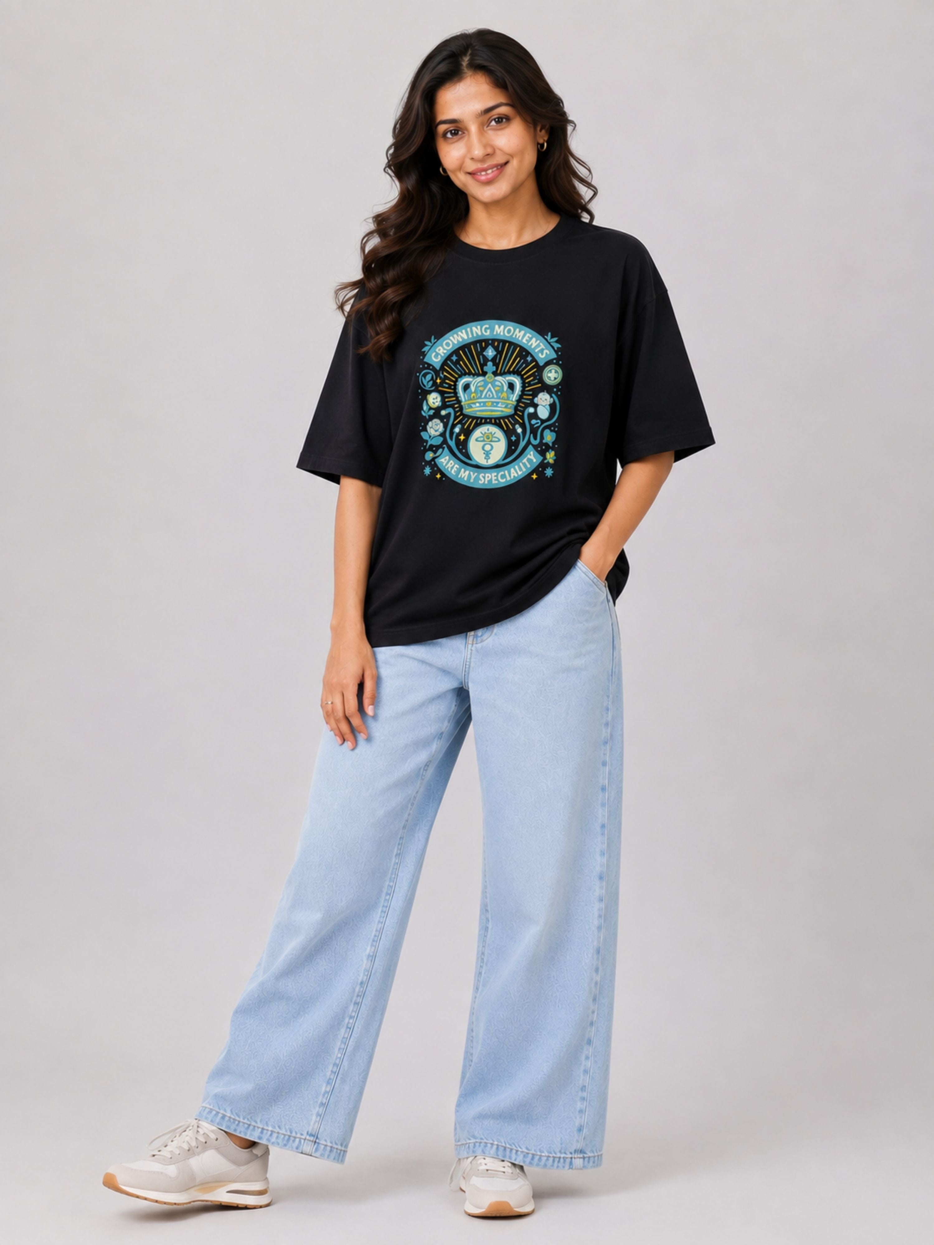 Black oversized fit Gynaecologist T shirt For Women with blue and white graphic worn by smiling woman