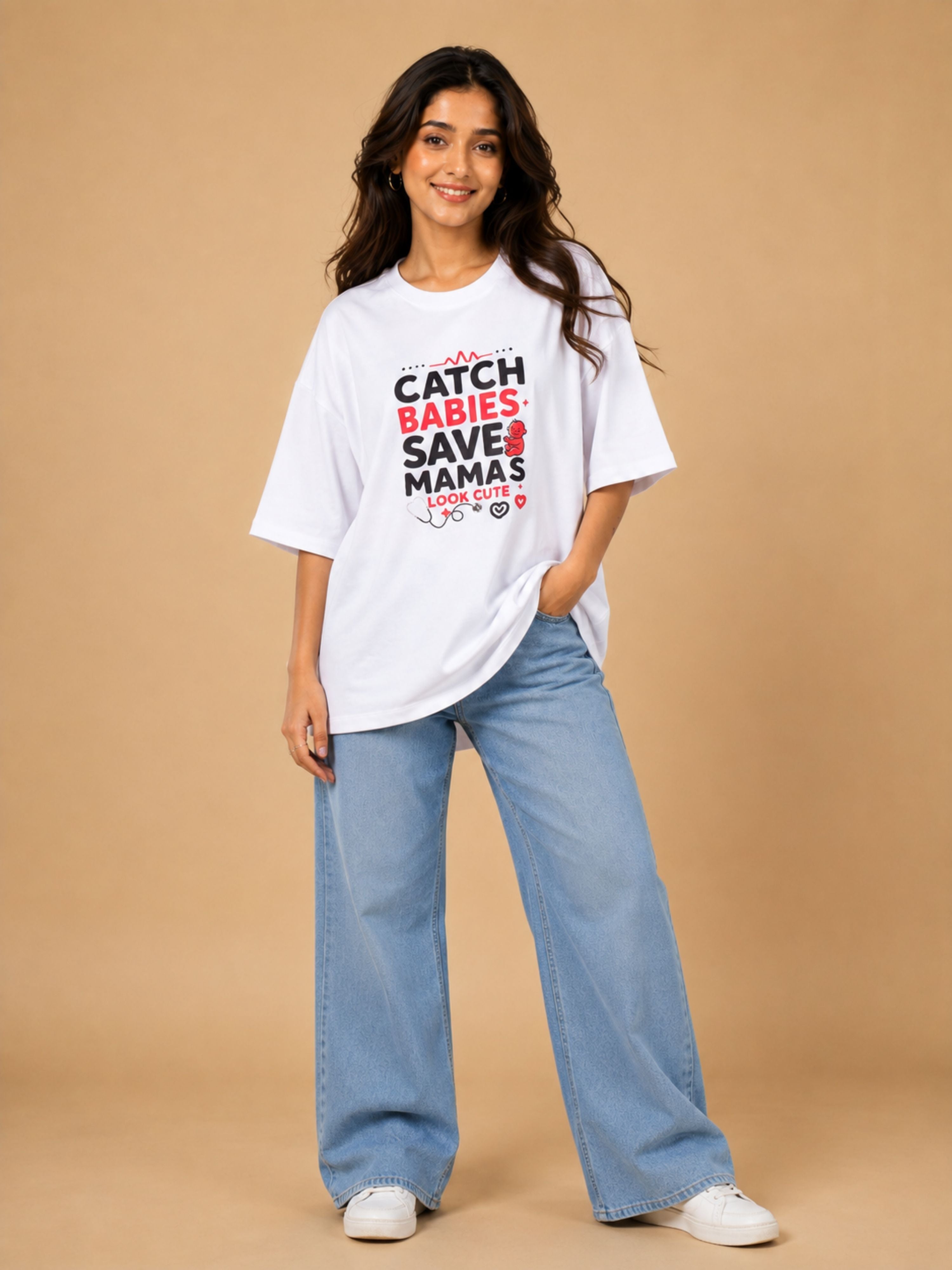 Woman wearing oversized fit Gynaecologist T-Shirt For Women with Catch Babies Save Mamas print