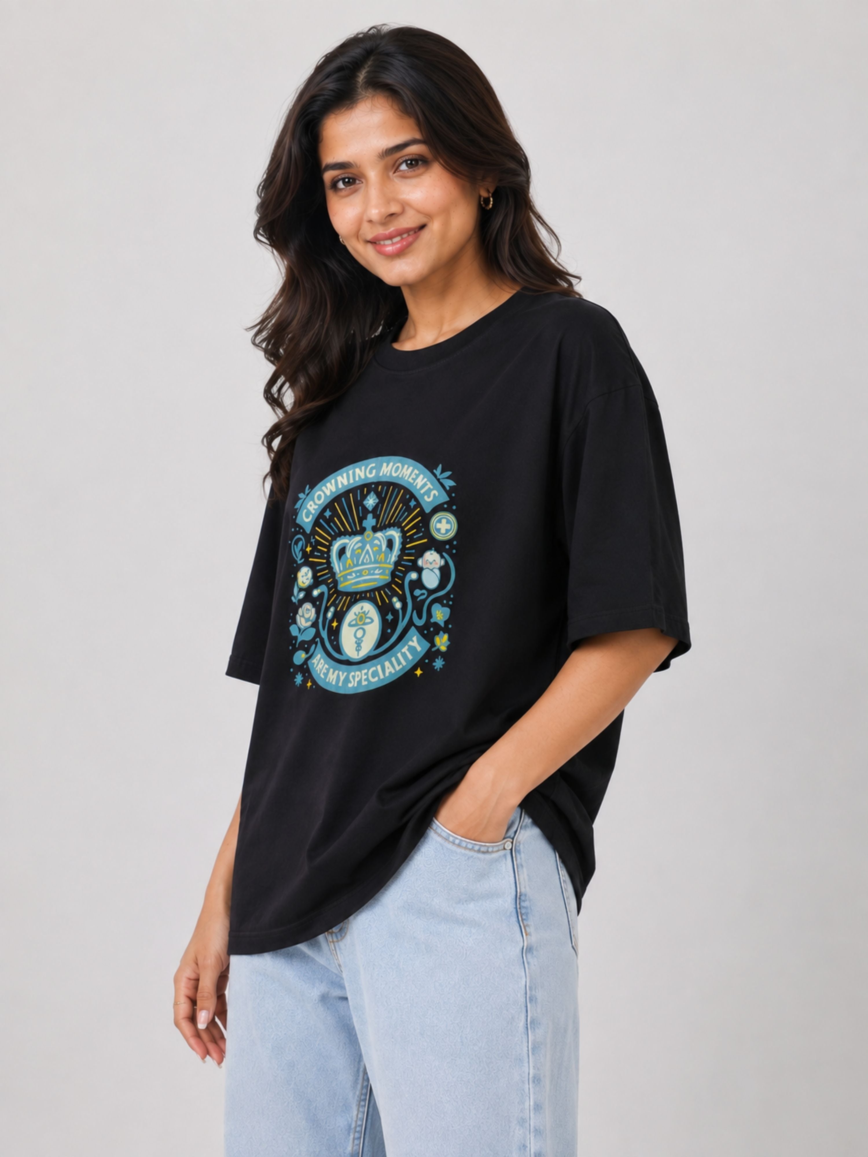 Black oversized fit Gynaecologist T shirt For Women with blue graphic print worn with light blue jeans