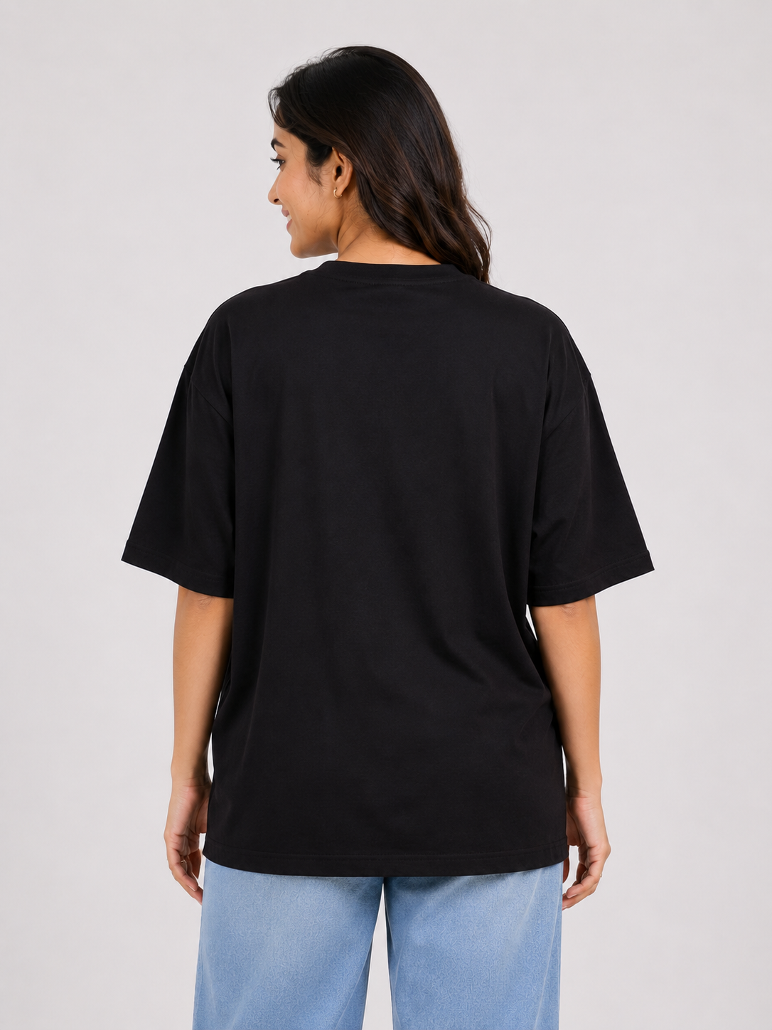 Back view of oversized fit black Gynaecologist Trendy T-shirt For Women by Bandar Baant Collections