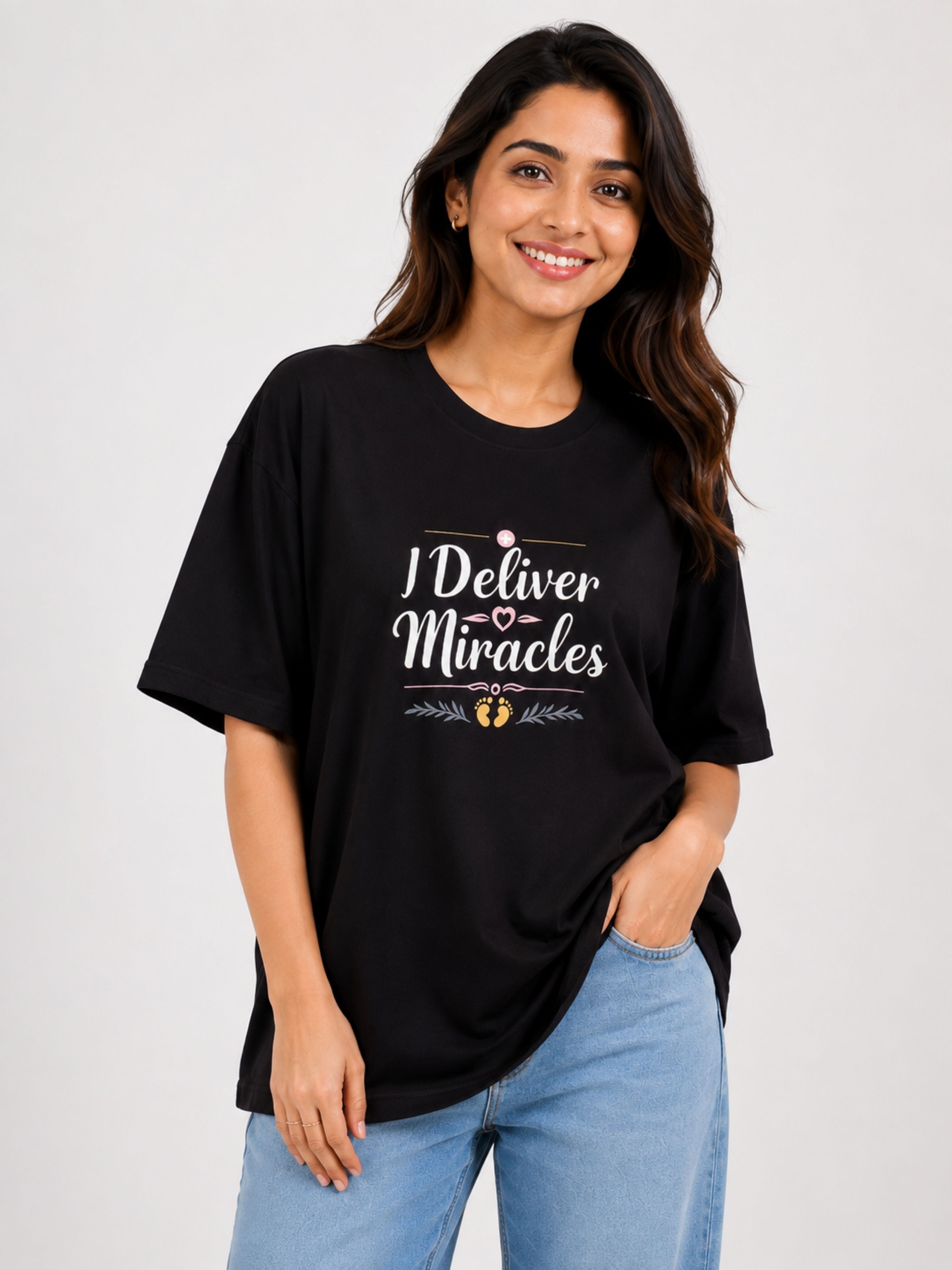 Black oversized fit Tshirt from Bandar Baant Collections with I Deliver Miracles print Gynaecologist Trendy T-shirt For Women