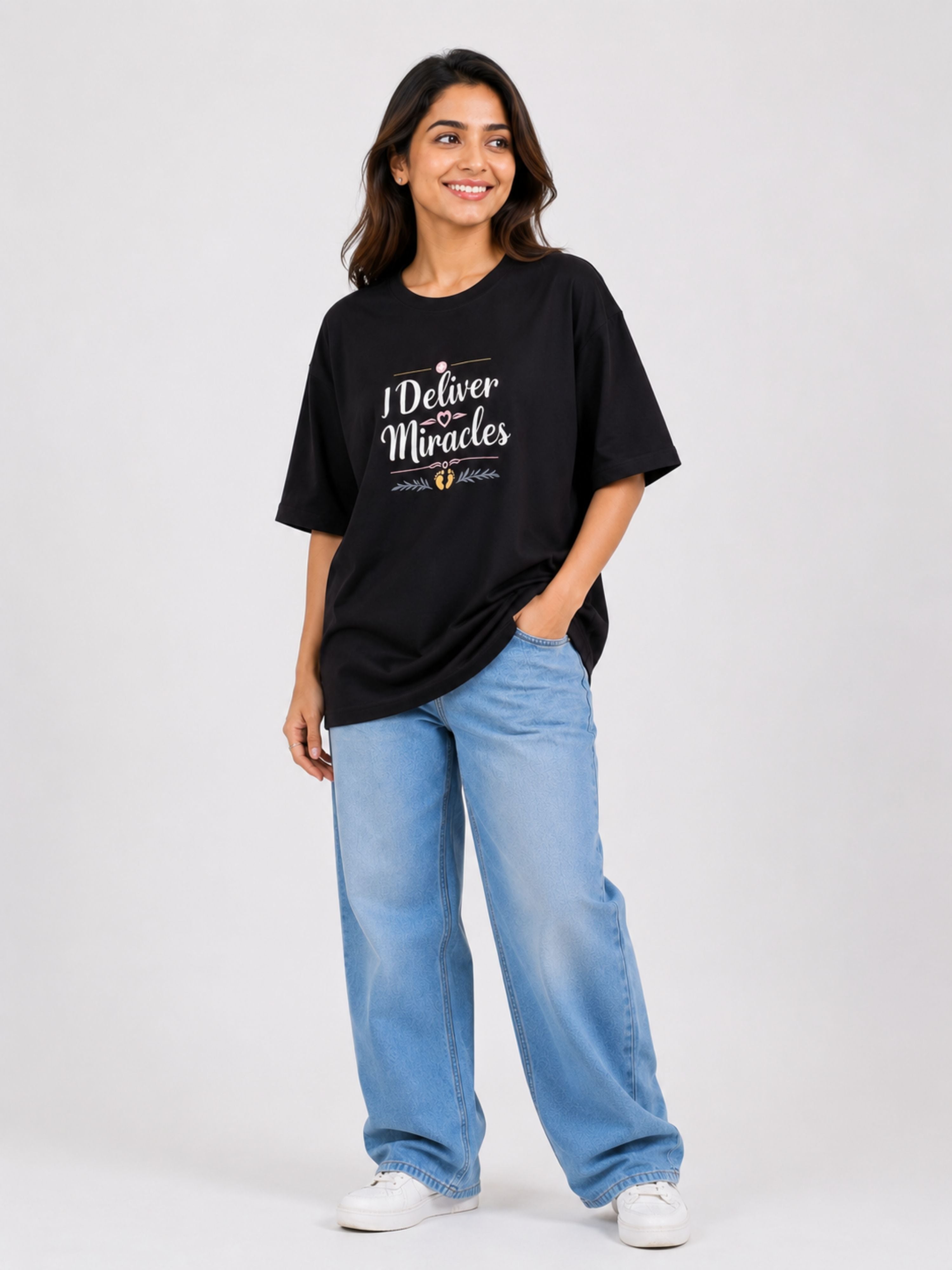 Gynaecologist Trendy T-shirt For Women oversized fit black tee with I Deliver Miracles print