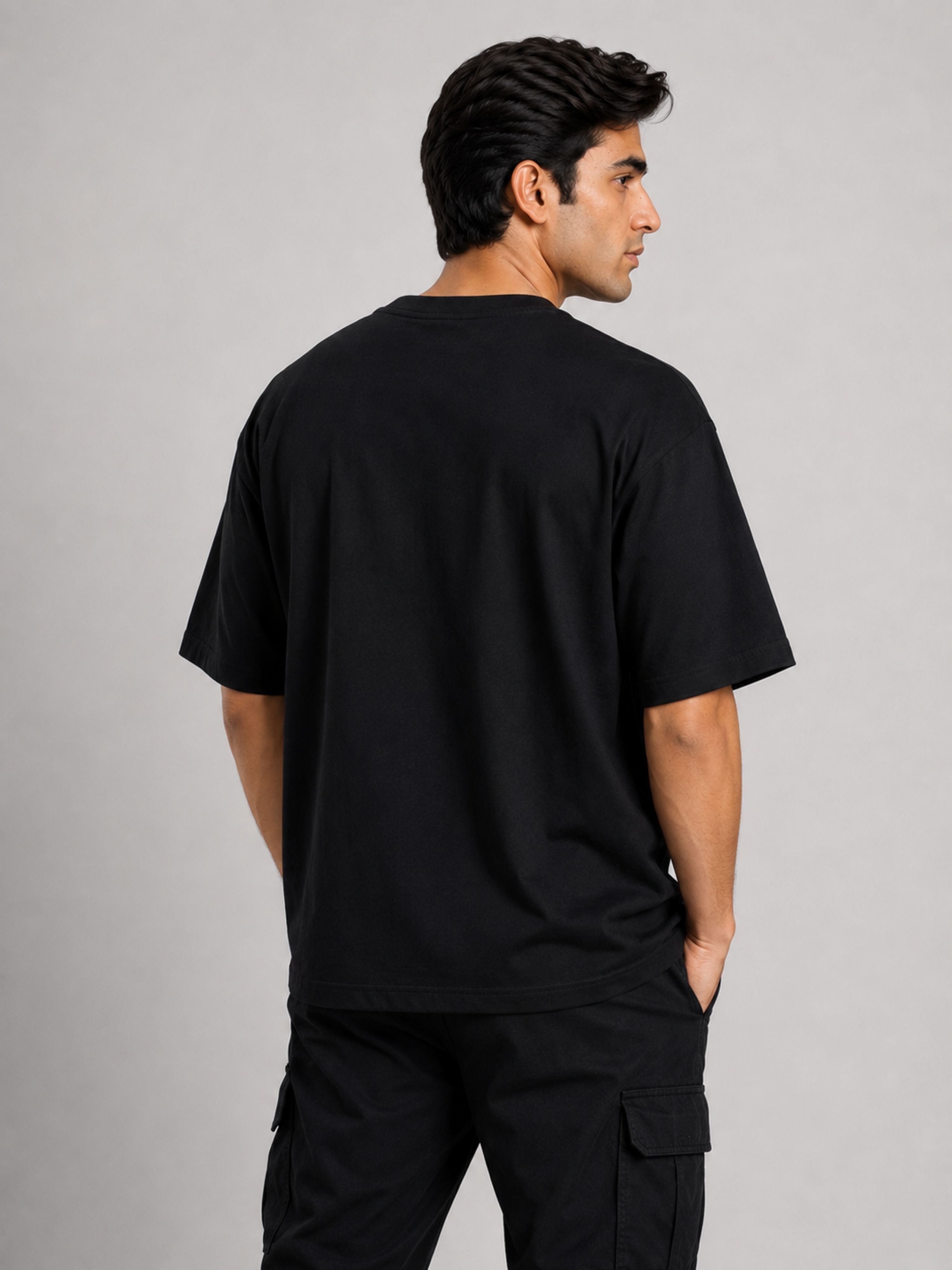 Black oversized fit Gynaecologist Tshirt For Men by Bandar Baant Collections shown from back