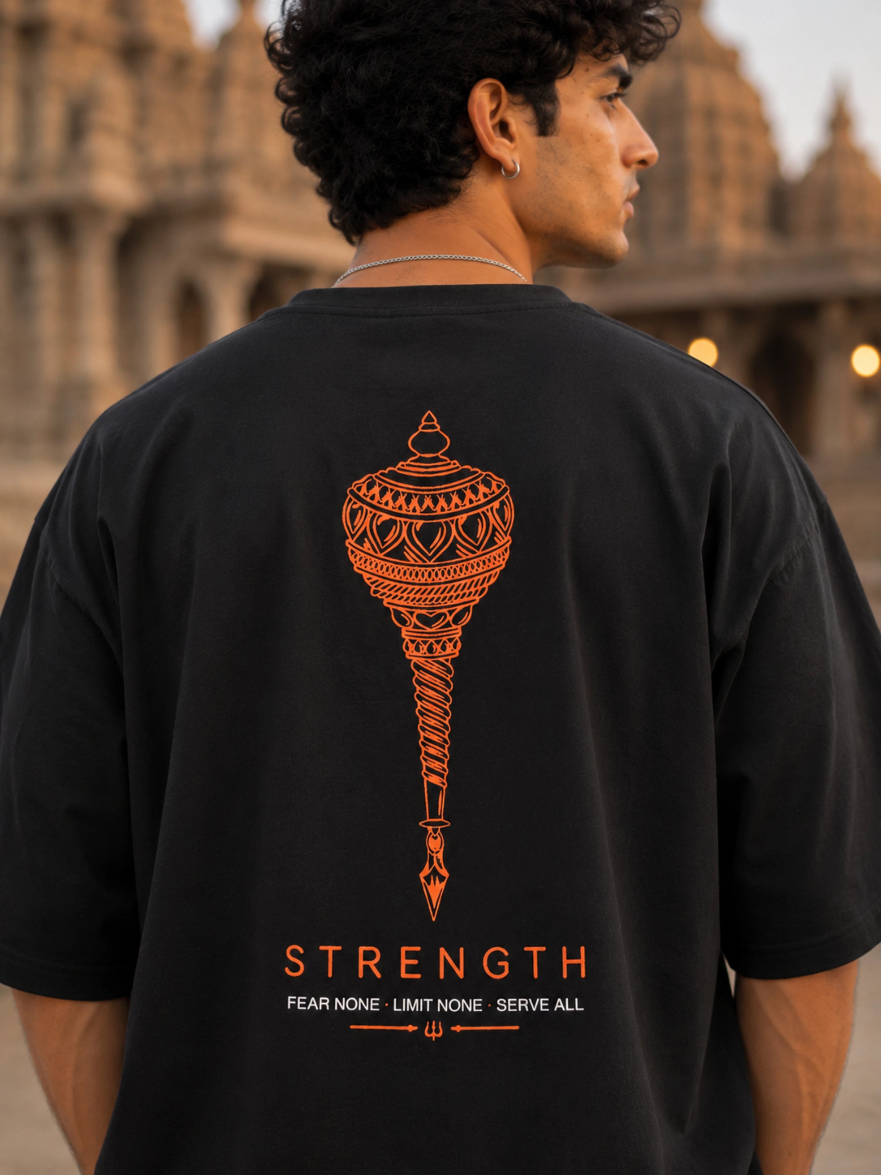 Bandar Baant Collections oversized fit HANUMAN T-shirt For Men in black with orange strength design on back