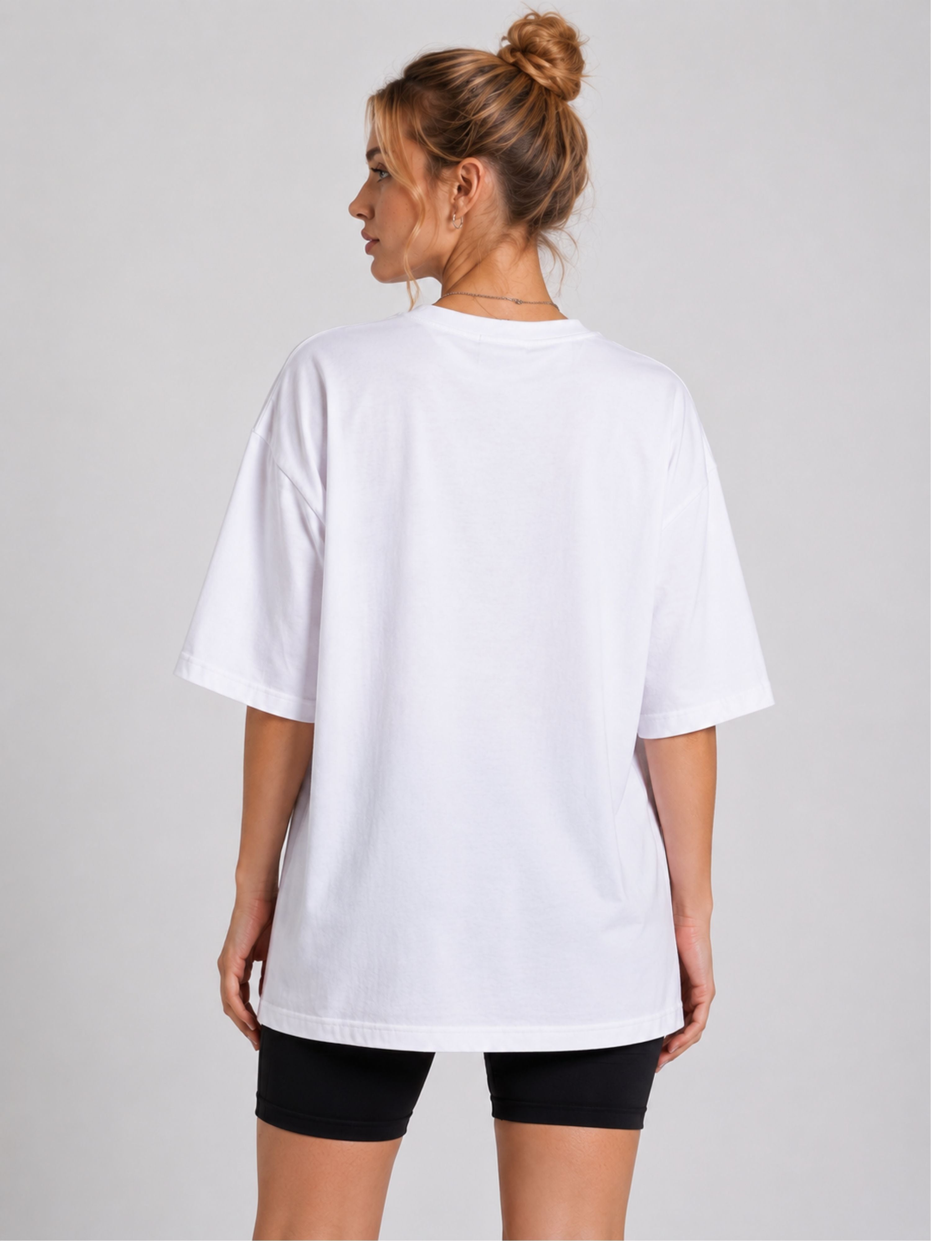 Back view of oversized fit Tshirt from Bandar Baant Collections for women in plain white Journalists Printed T-shirts For Women
