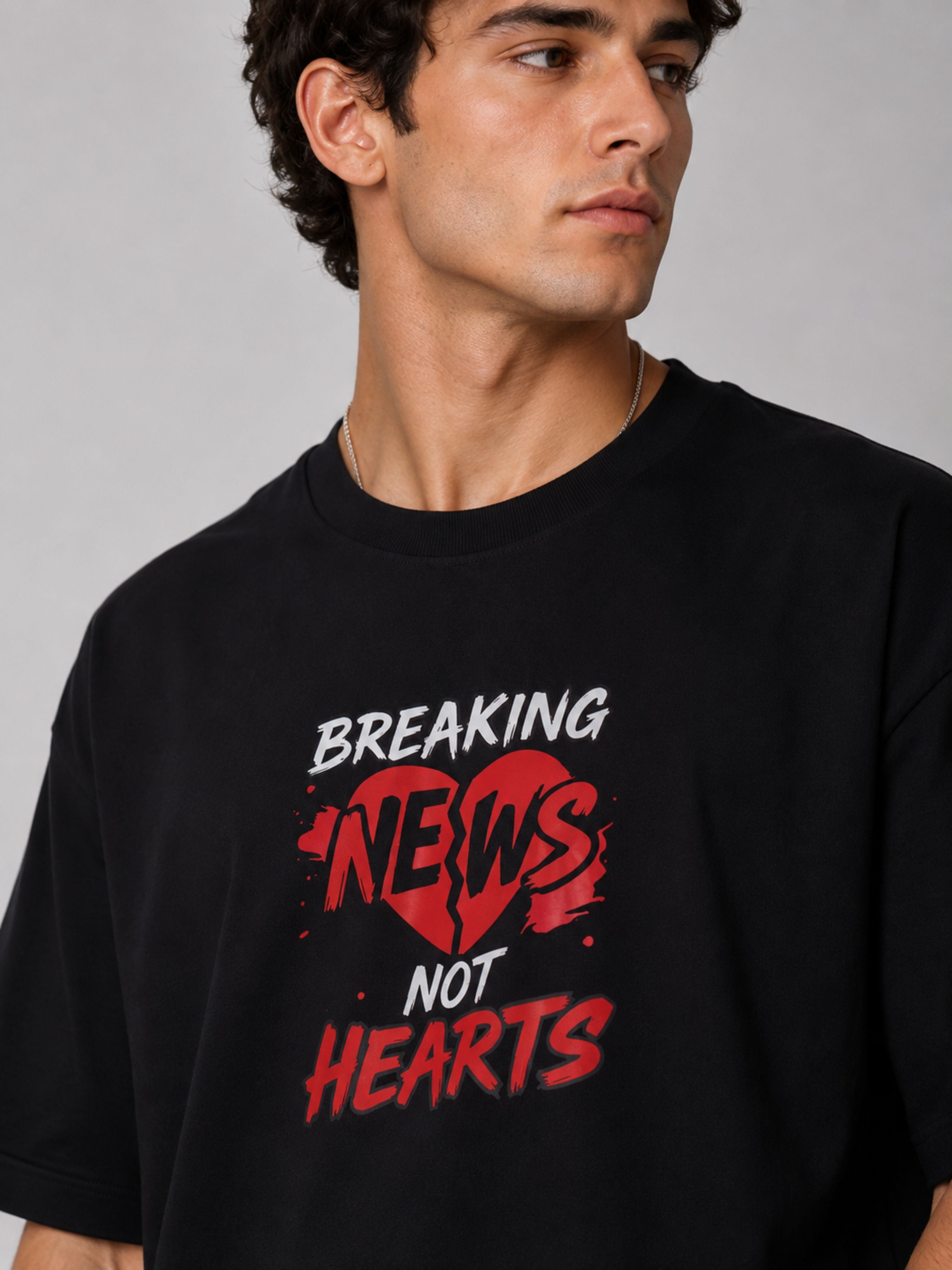 Black oversized fit Journalists T-shirt For Men with breaking news graphic and red heart design