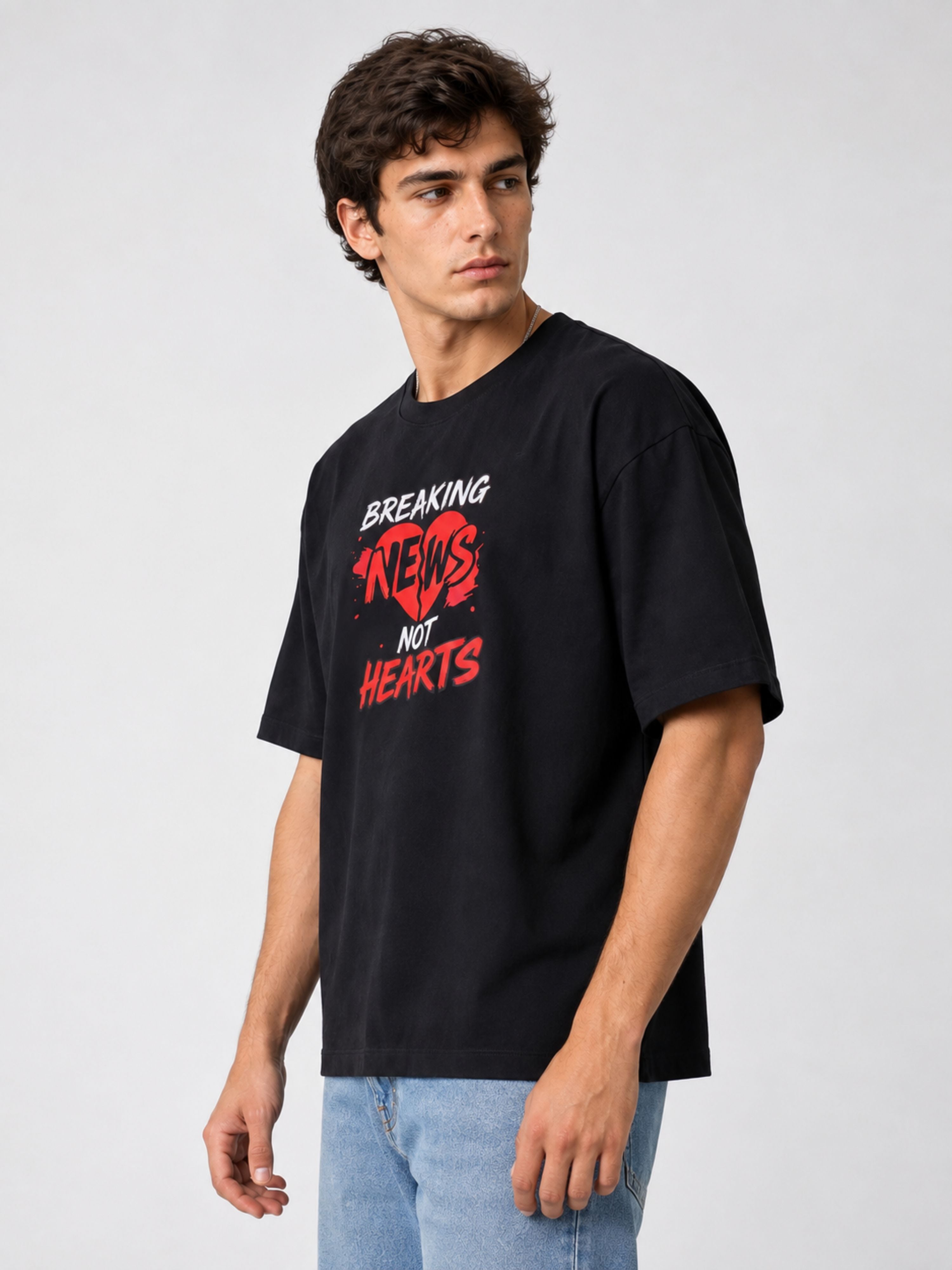 Black oversized fit Journalists T-shirt For Men with Breaking News Not Hearts graphic by Bandar Baant Collections