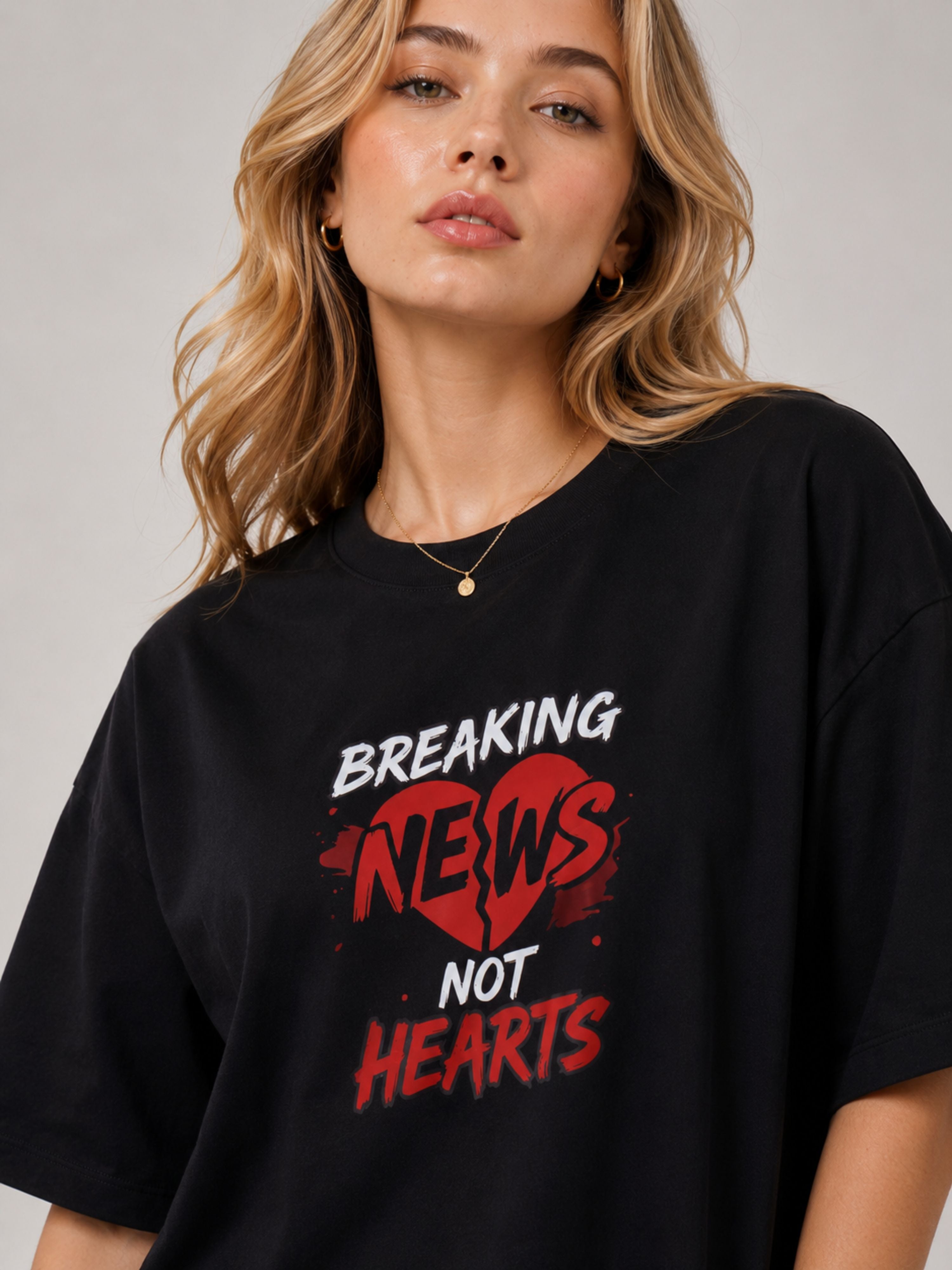 Black oversized fit Journalists T-Shirt For Women with graphic text breaking news not hearts