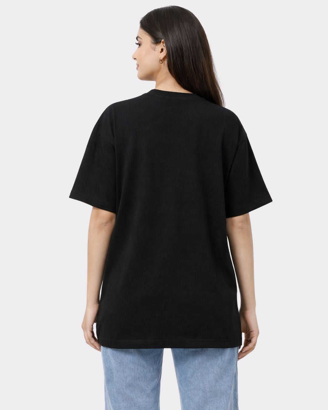 Back view of a woman wearing Lawyer Oversized Quirky T-Shirt For Women in black from Bandar Baant Collections