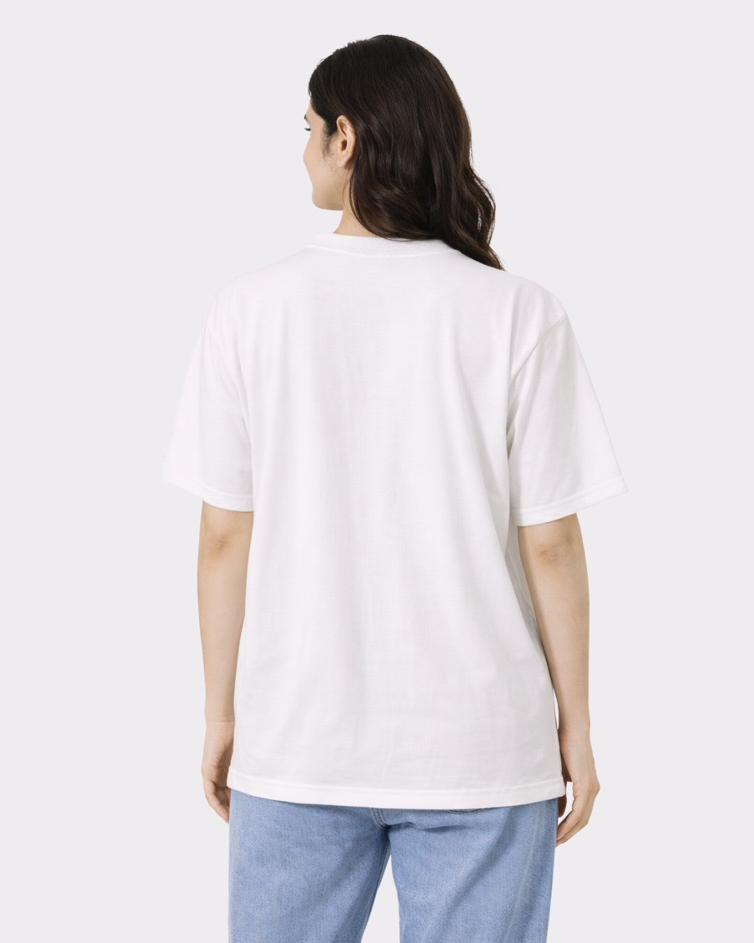 Back view of a woman wearing a white Lawyer Oversized Quote T-Shirt For Women from Bandar Baant Collections