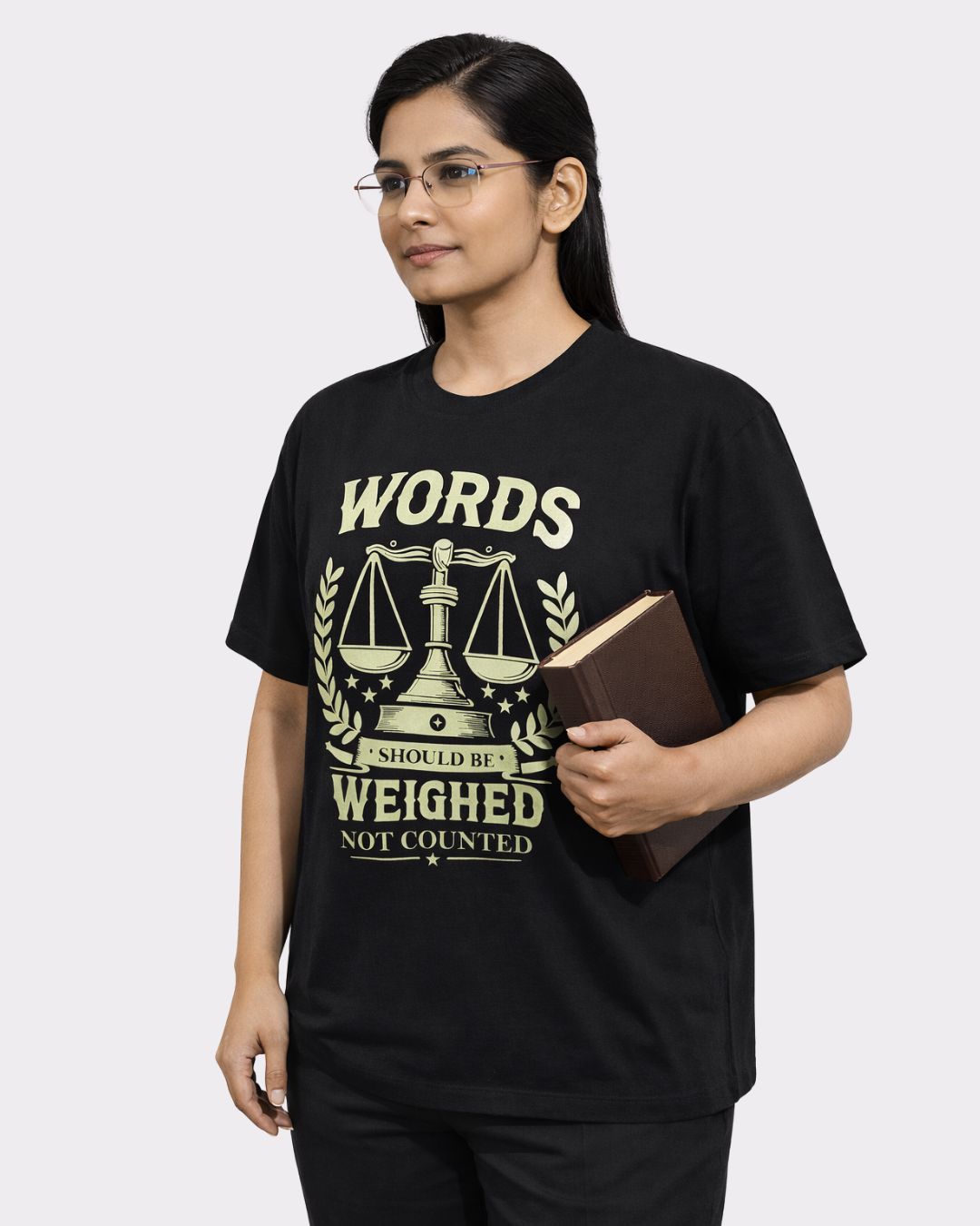 Lawyer Oversized T-Shirt For Women in black with scales of justice graphic and motivational text