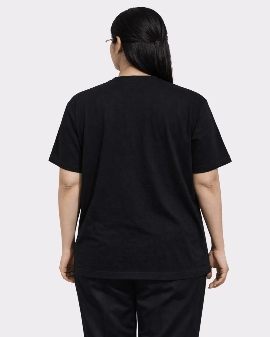 Back view of woman wearing black Lawyer Oversized Trendy T-Shirt For Women from Bandar Baant Collections