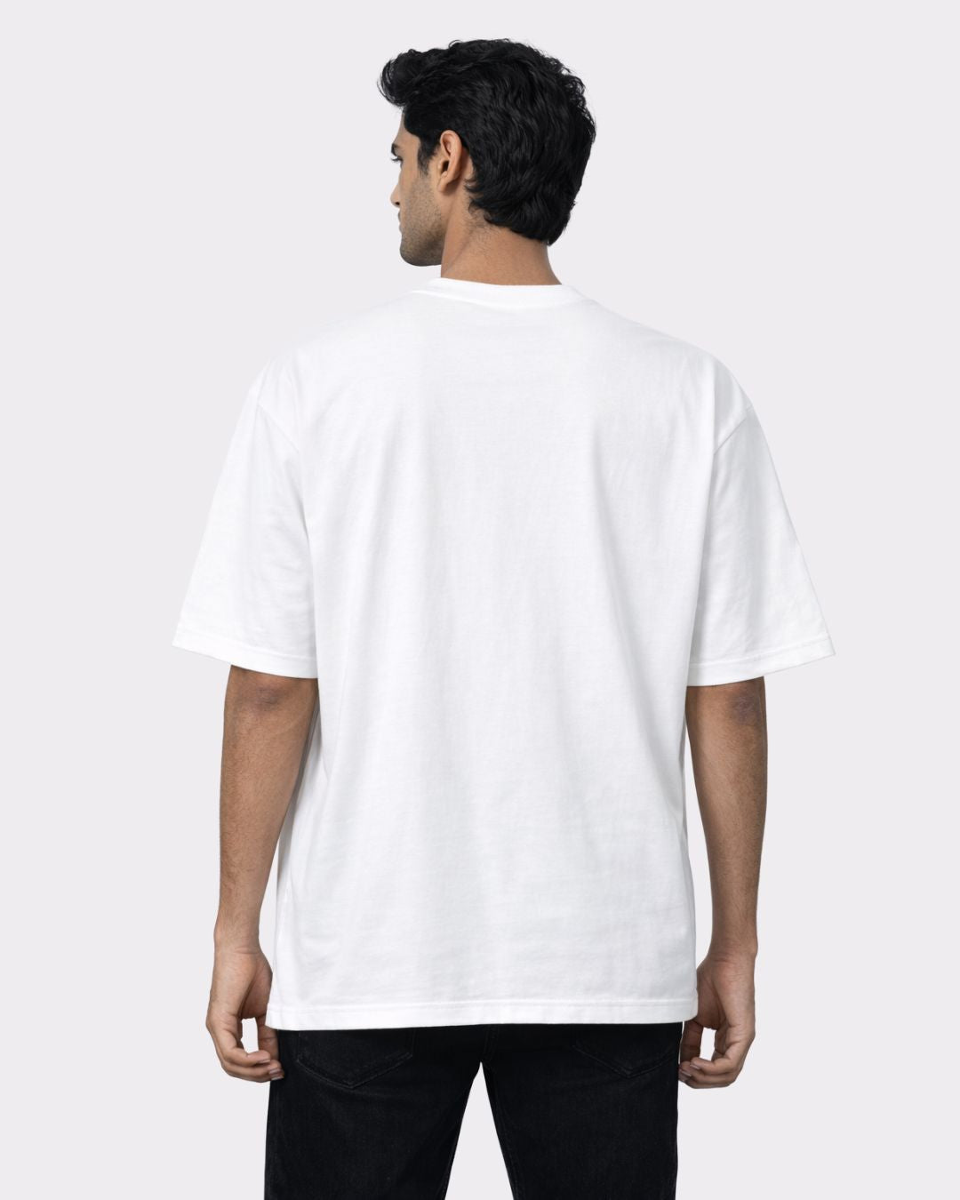 Back view of oversized fit white Lawyer Trendy T-Shirt For Men by Bandar Baant Collections worn by male model