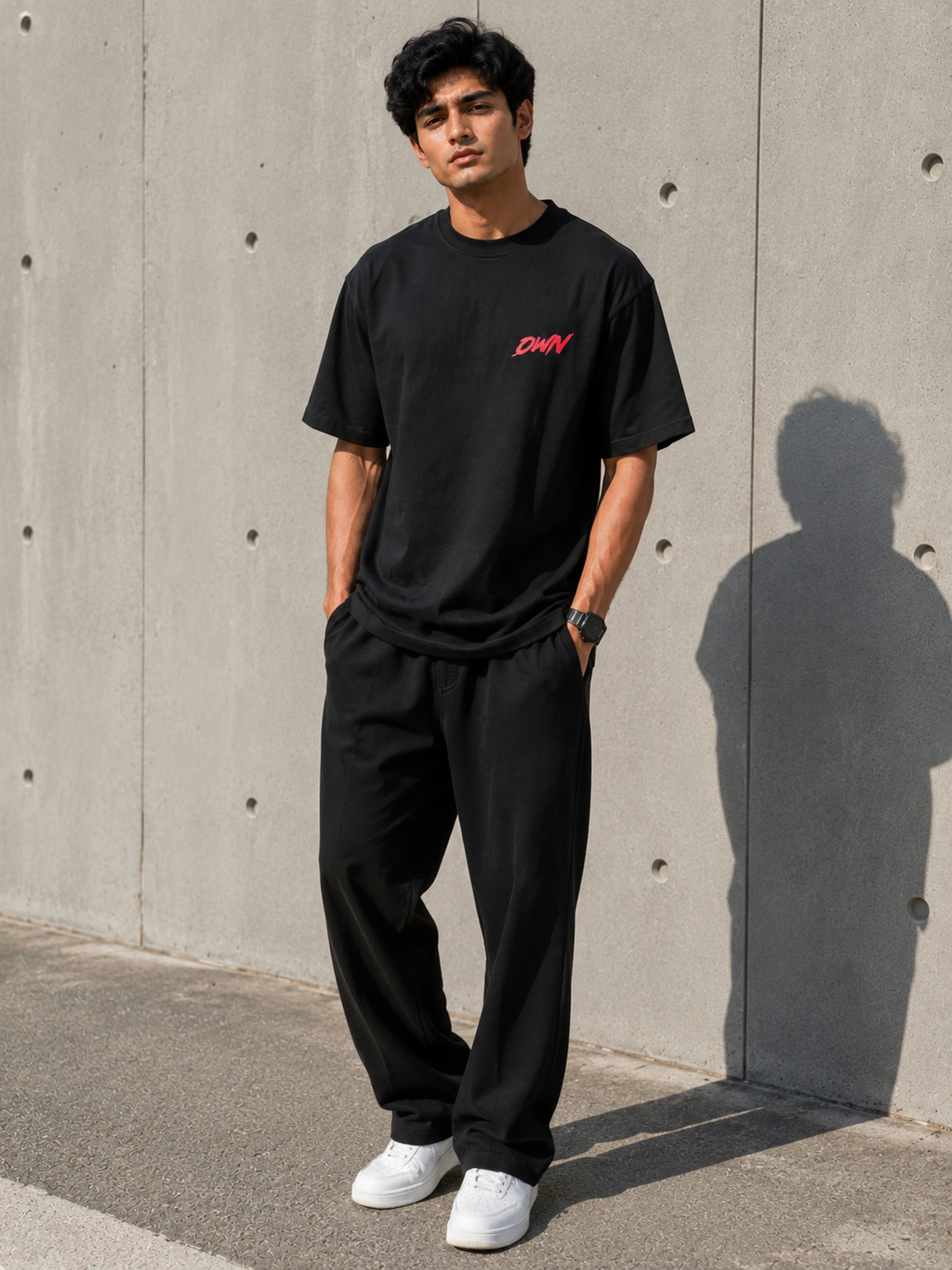 Martial Artists T-shirt For Men oversized fit black tshirt with red logo worn by male model