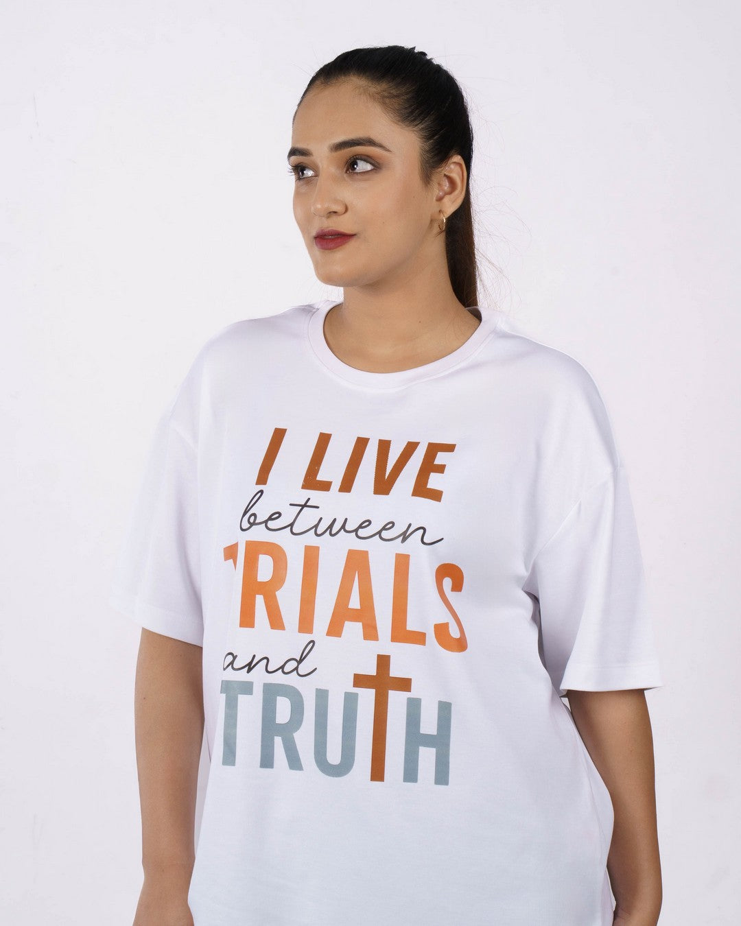 Oversized fit Medical Researcher Tshirt For Women in white with I live between trials and truth text