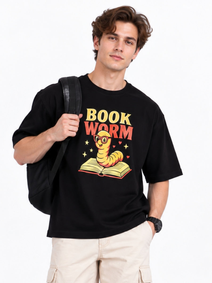 Black oversized T-Shirt for men with book worm graphic and cartoon worm reading a book