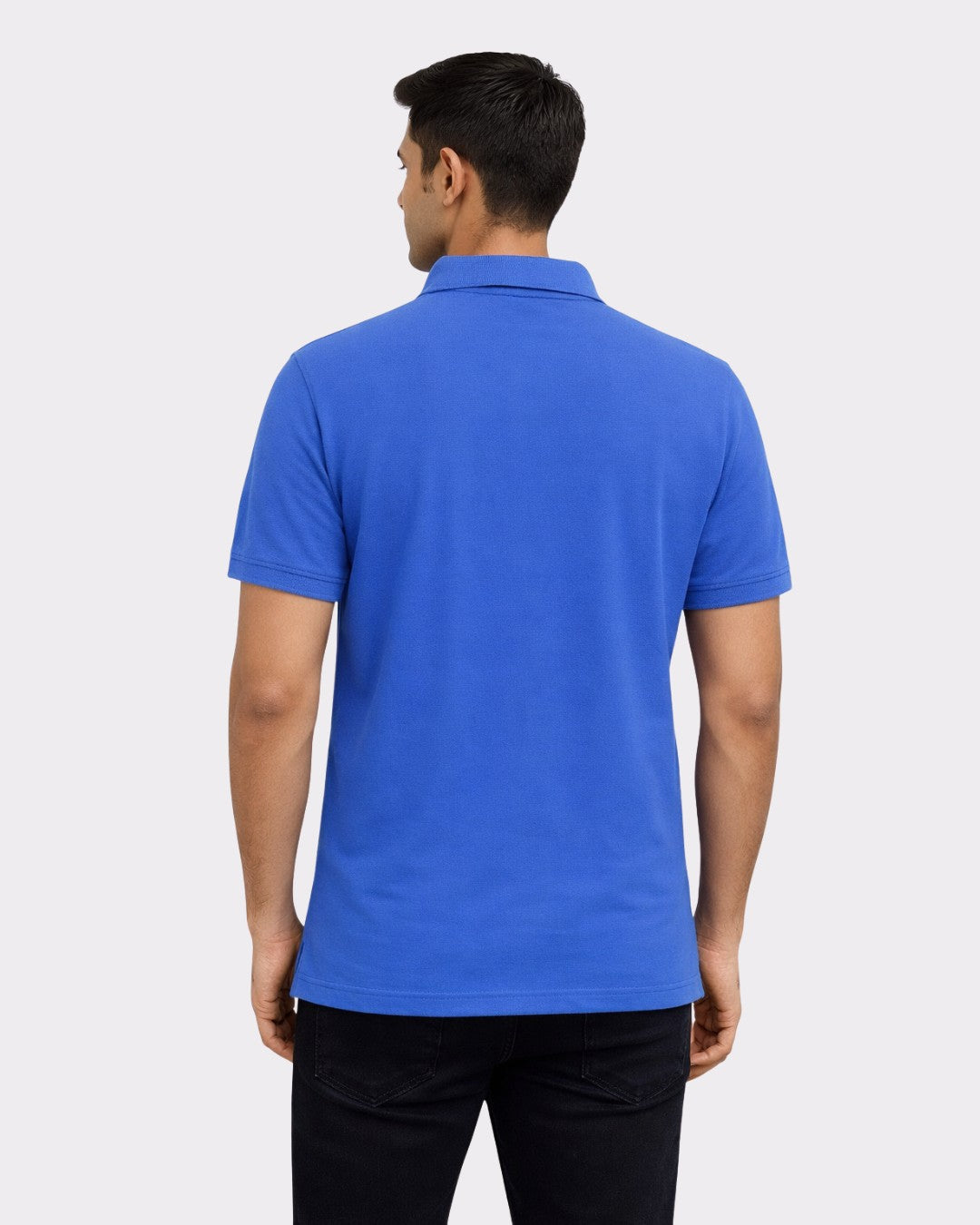 Back view of a man wearing a blue oversized fit Polo T-shirt For Men by Bandar Baant Collections