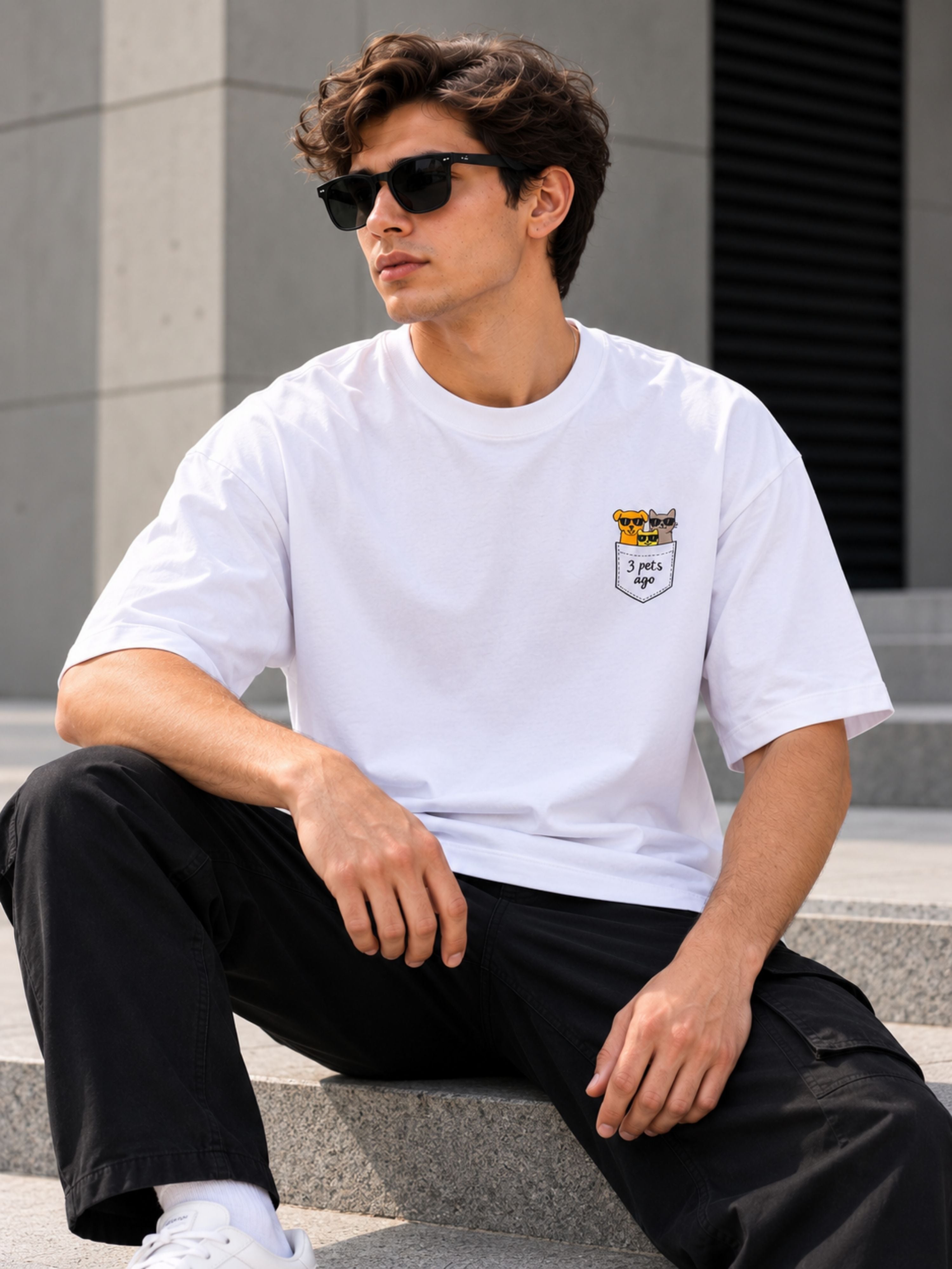 Pet Lover Tshirt For Men oversized fit white tshirt with small cartoon pets on pocket worn by man
