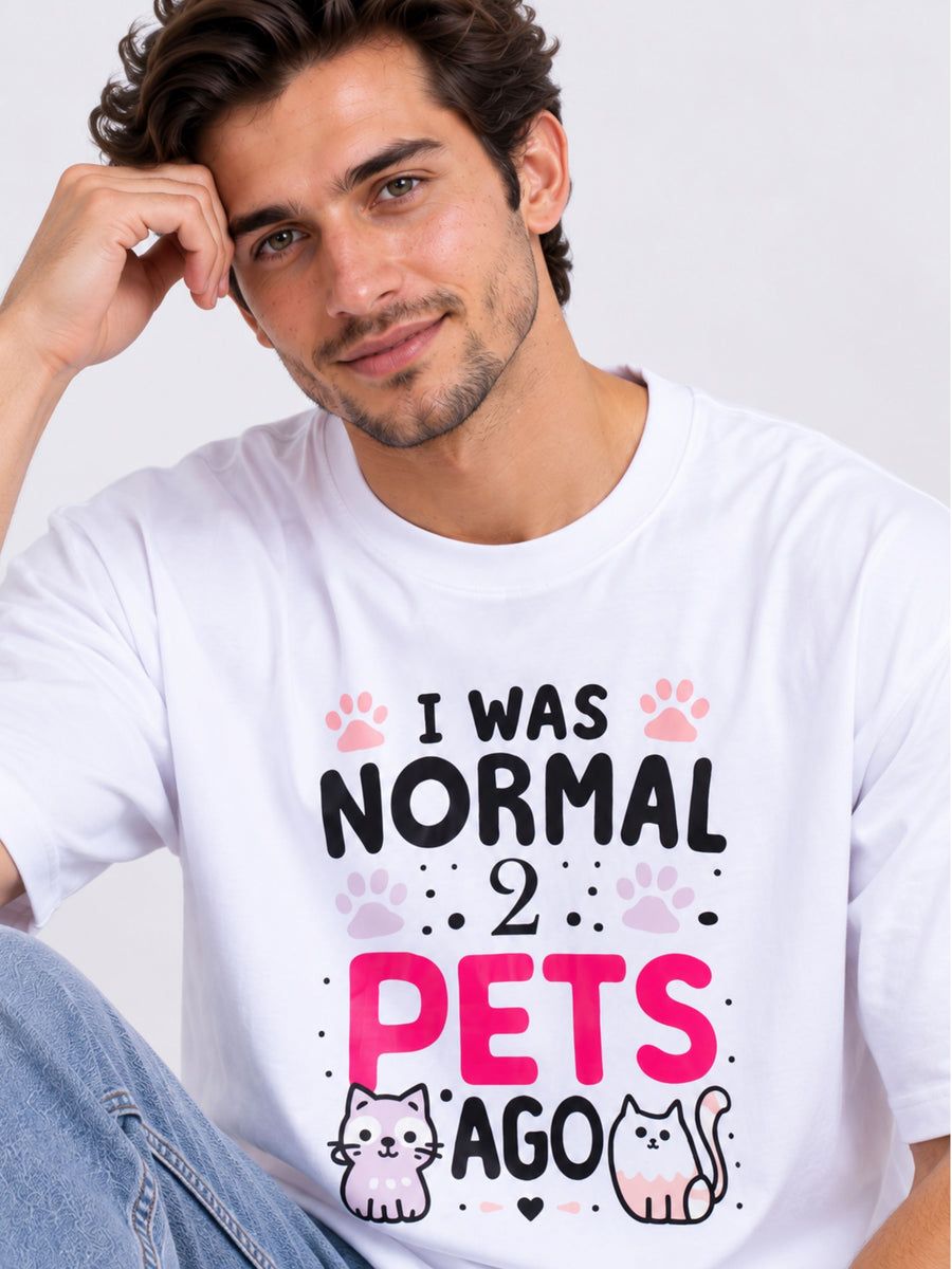 Pet Parent Oversized Tshirt For Men white with playful pet graphic and text worn by man