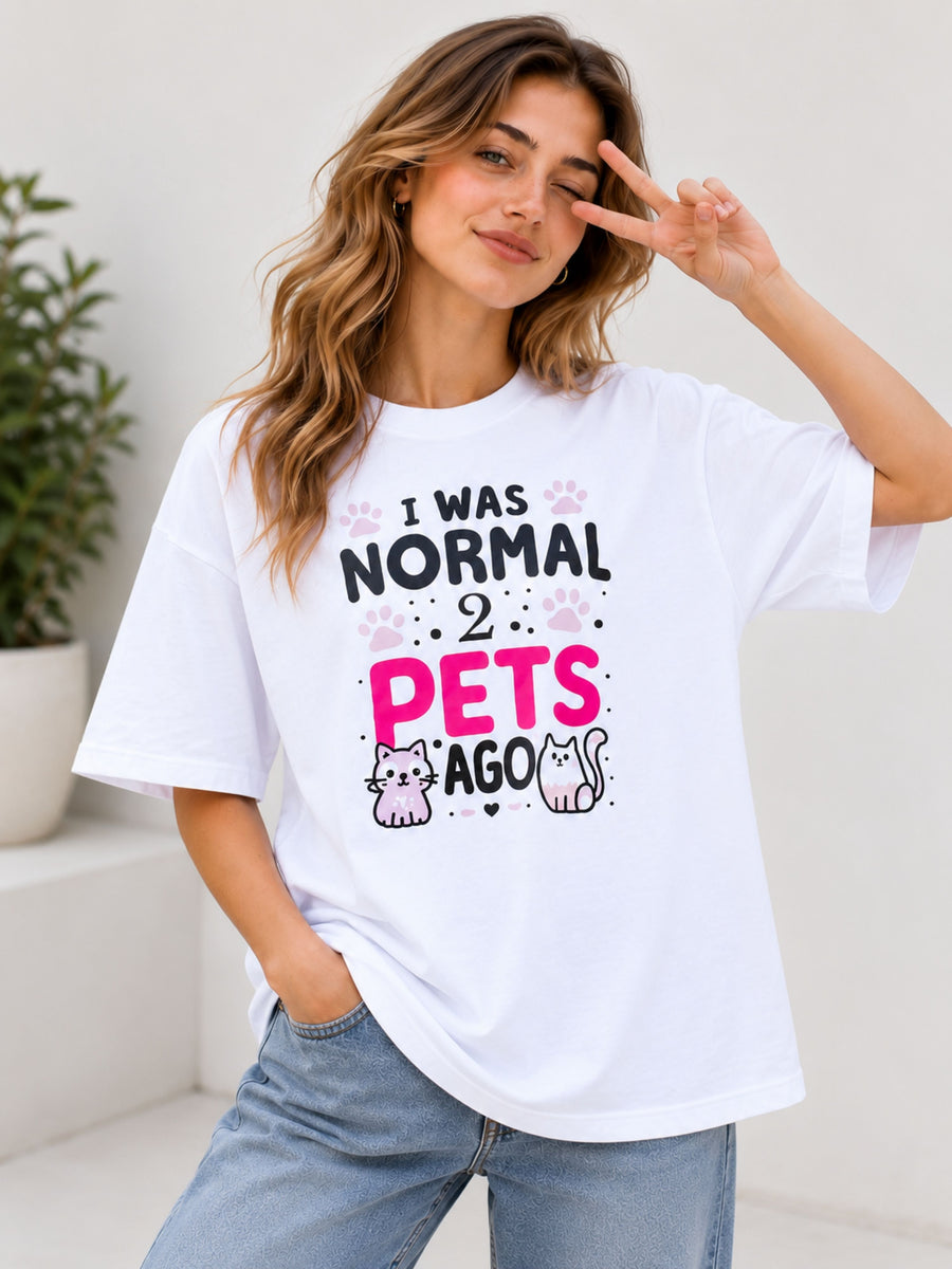 Pet Parent Oversized Tshirt For Women white with funny pet design worn by smiling woman